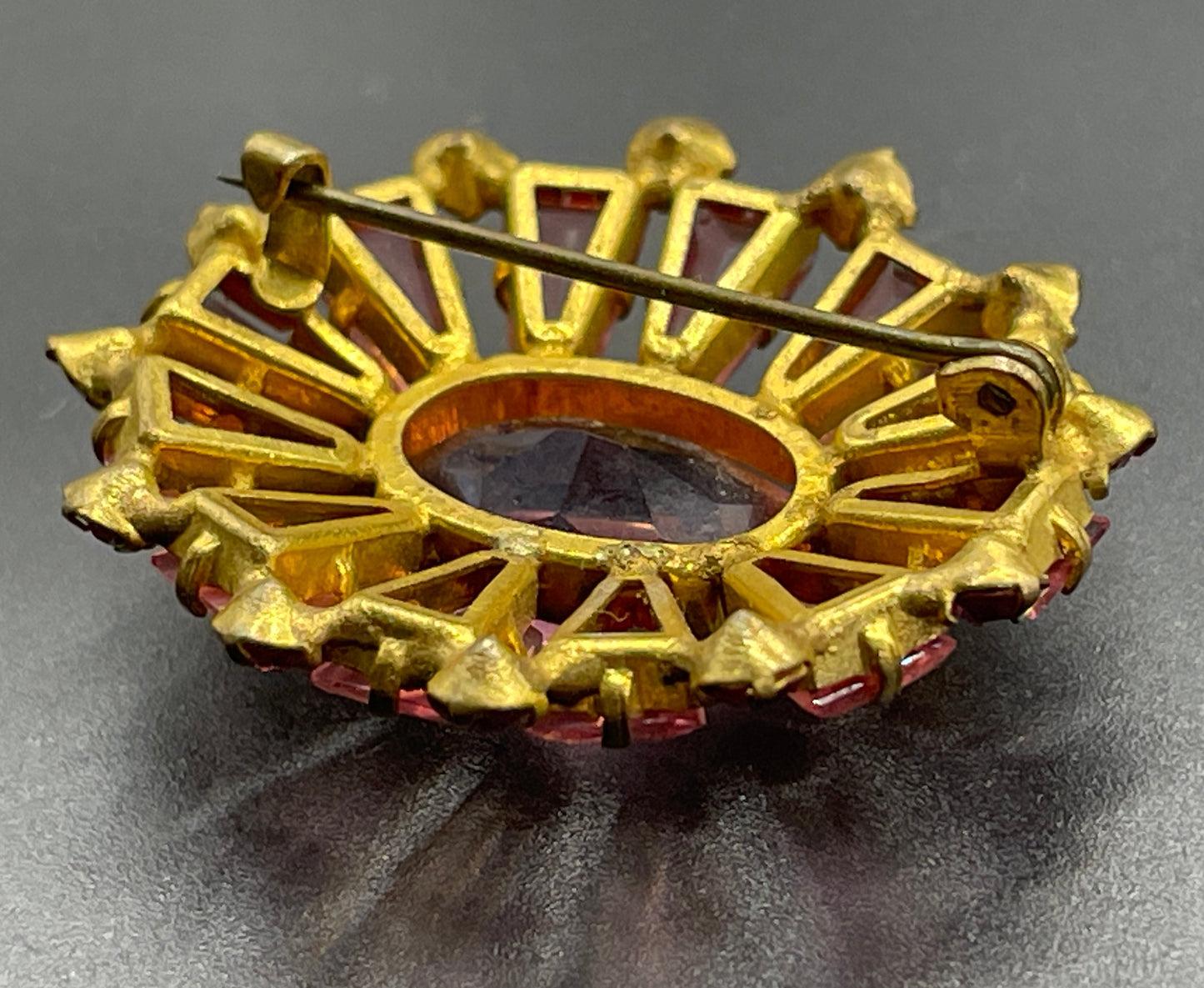 Vintage Art Deco Czech ruby pink glass, unusual shaped rhinestone, open-backed, gold tone brooch pin, petite size