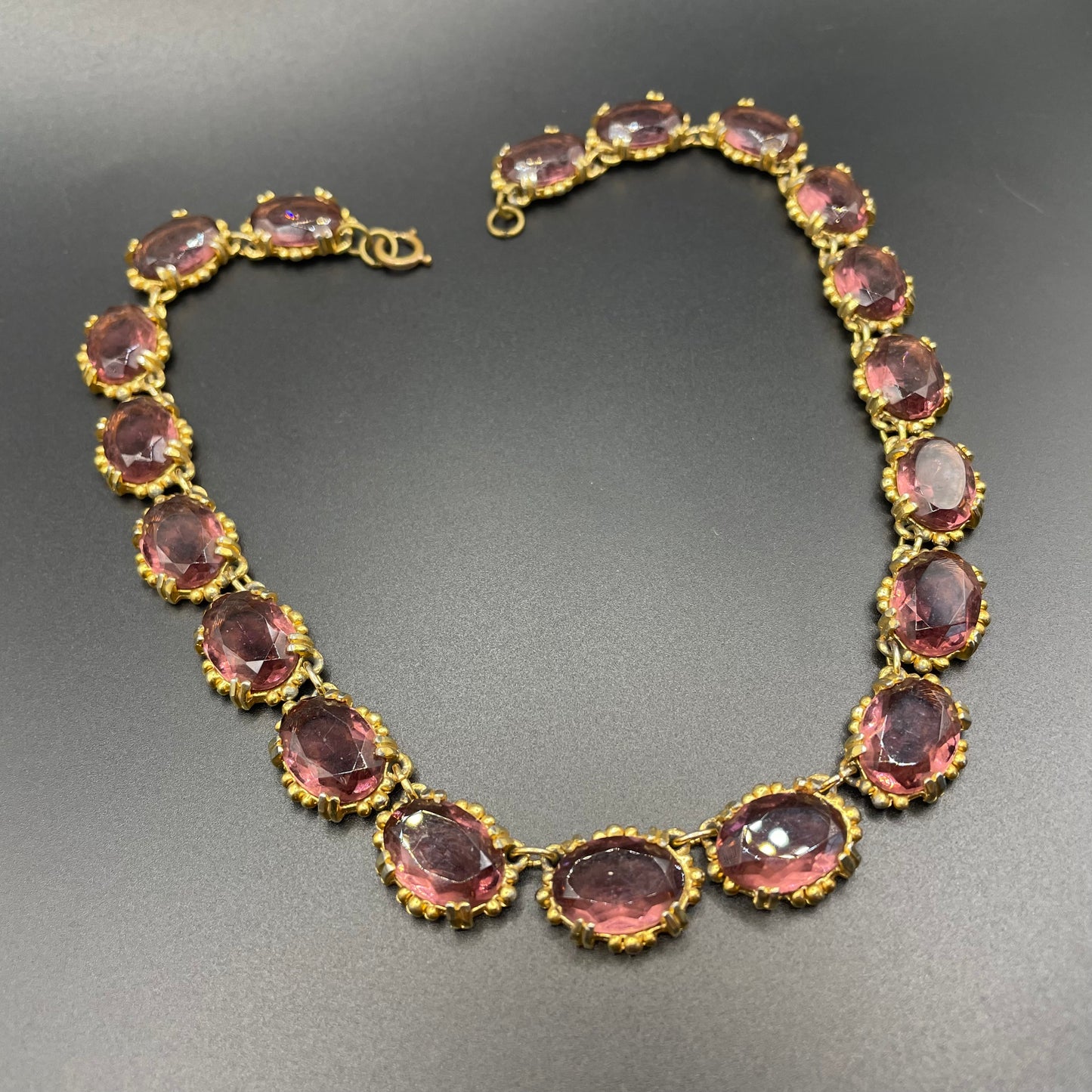 Vintage Sphinx amethyst purple / violet glass riviere necklace, heavy, bezel set, open-backed stones in ornate gold tone setting