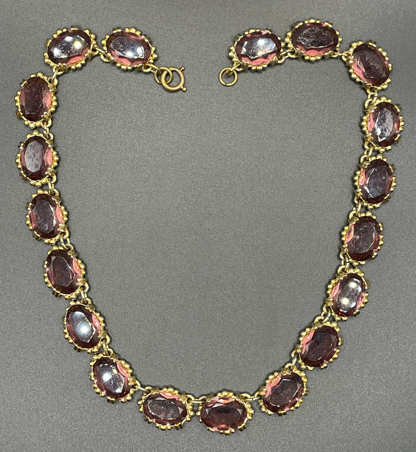 Vintage Sphinx amethyst purple / violet glass riviere necklace, heavy, bezel set, open-backed stones in ornate gold tone setting