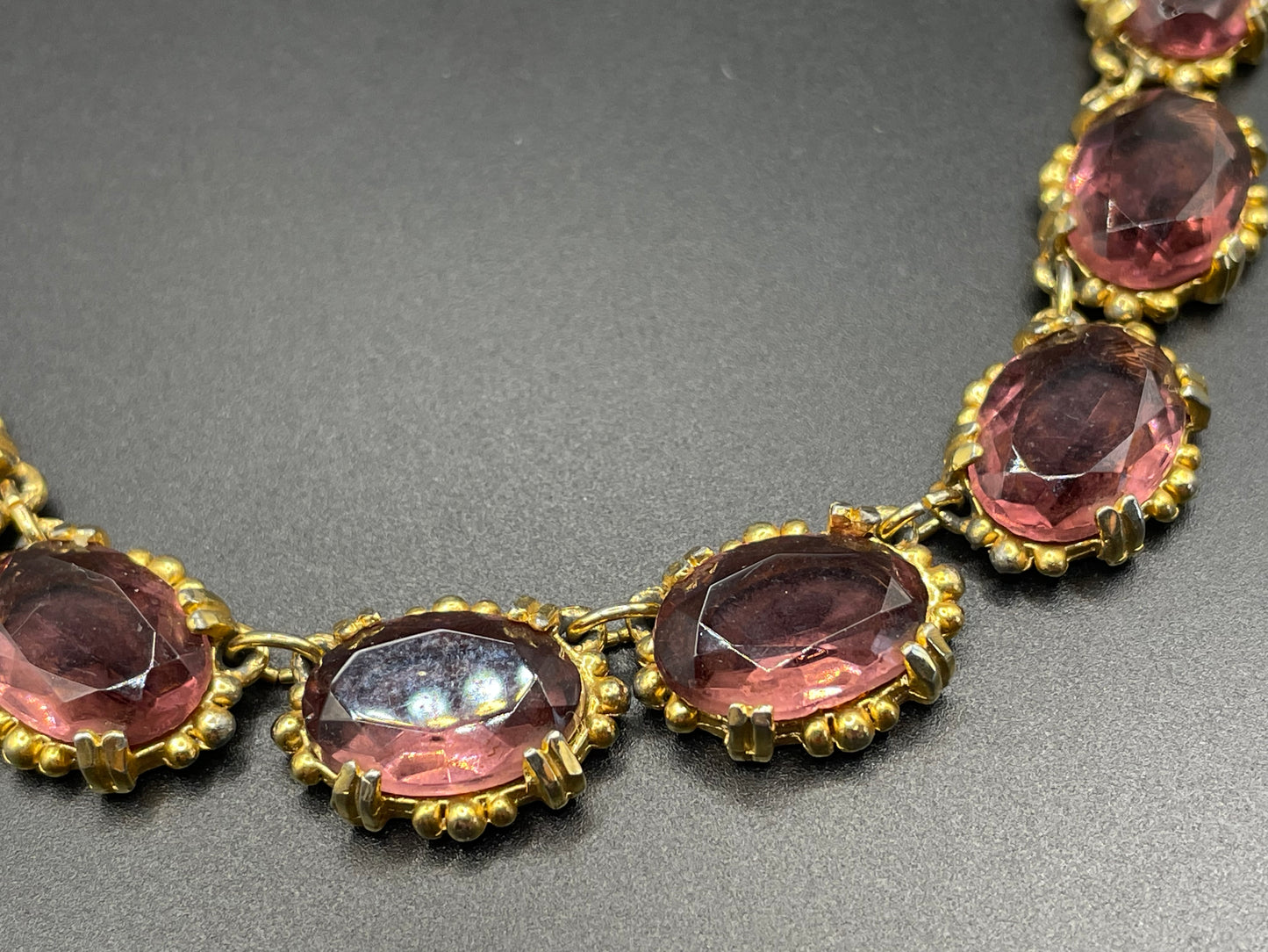 Vintage Sphinx amethyst purple / violet glass riviere necklace, heavy, bezel set, open-backed stones in ornate gold tone setting