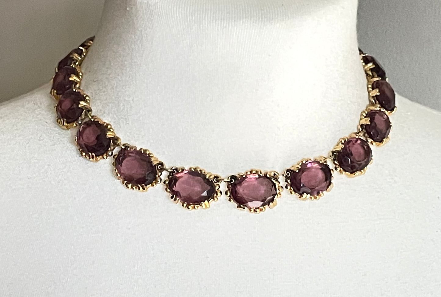 Vintage Sphinx amethyst purple / violet glass riviere necklace, heavy, bezel set, open-backed stones in ornate gold tone setting