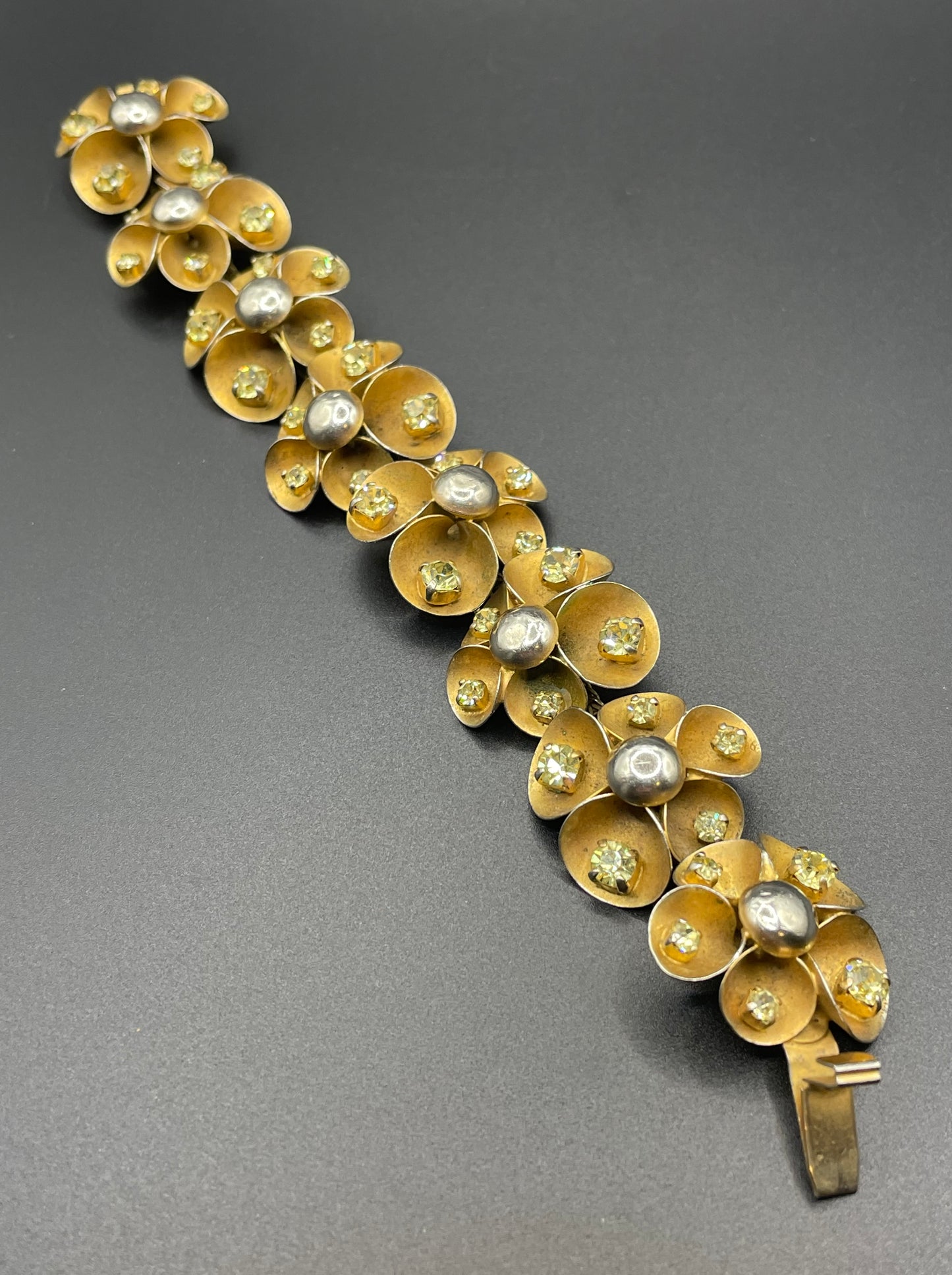 Vintage ornate floral bracelet, heavy moulded gold tone petals gold tone metal cabochon centres & yellow rhinestones, possible Haskell