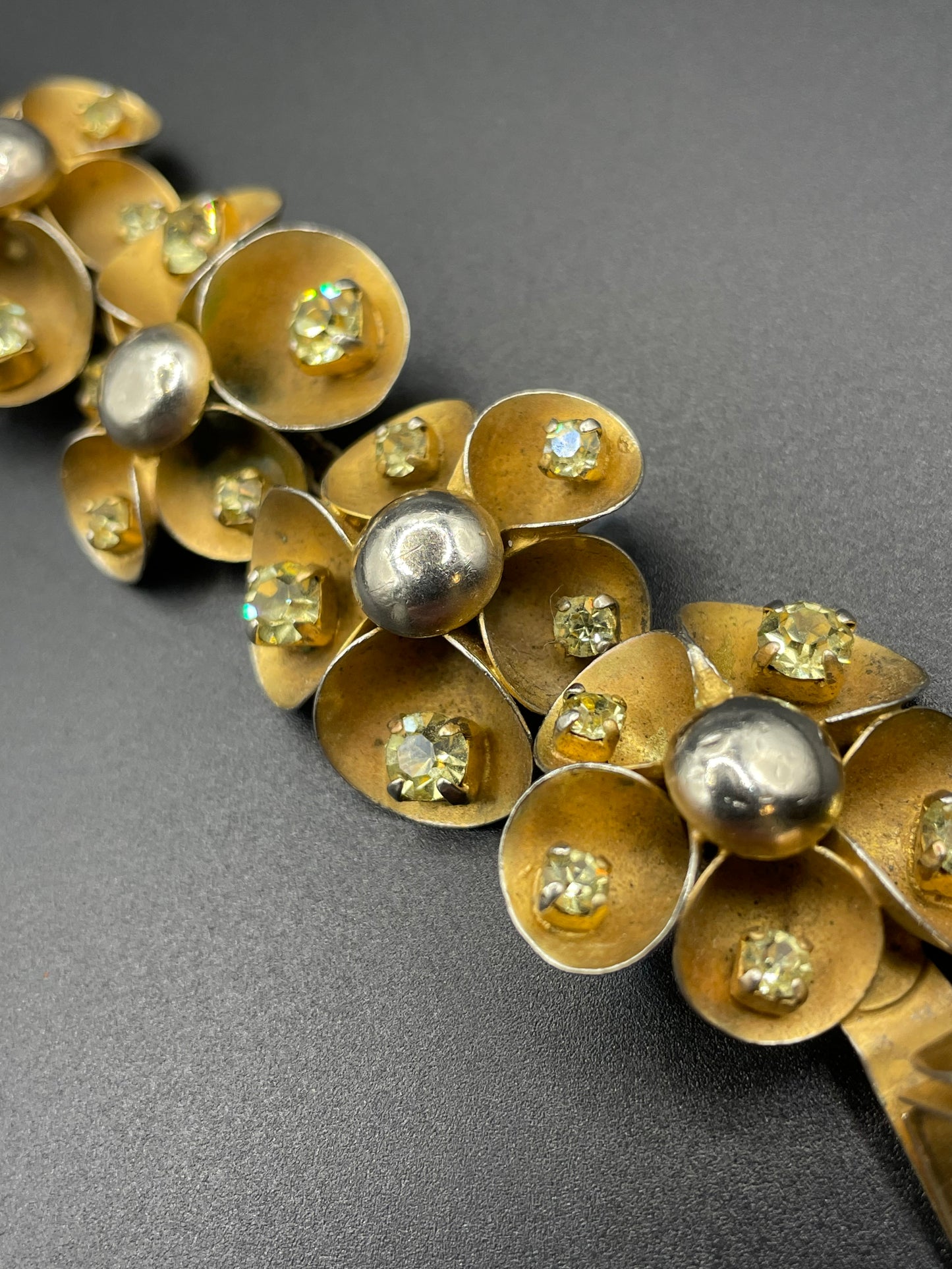Vintage ornate floral bracelet, heavy moulded gold tone petals gold tone metal cabochon centres & yellow rhinestones, possible Haskell
