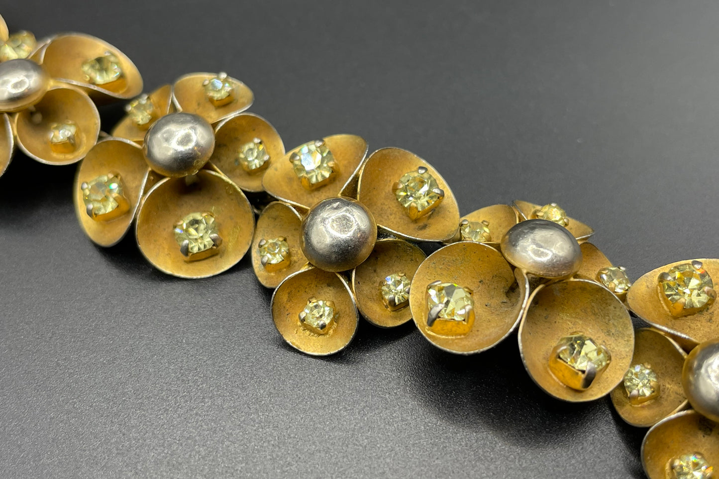 Vintage ornate floral bracelet, heavy moulded gold tone petals gold tone metal cabochon centres & yellow rhinestones, possible Haskell