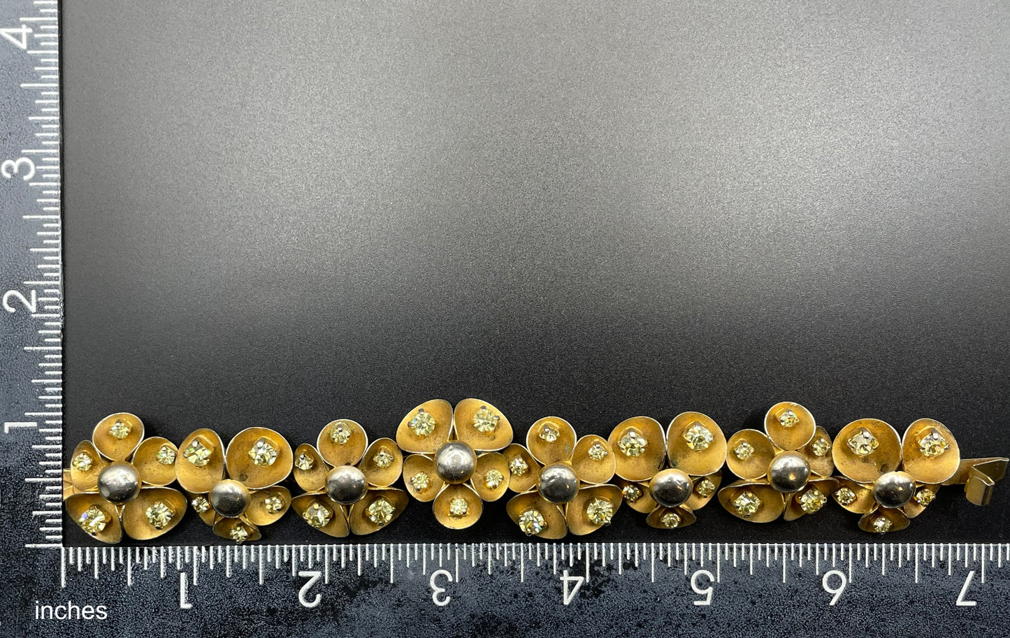 Vintage ornate floral bracelet, heavy moulded gold tone petals gold tone metal cabochon centres & yellow rhinestones, possible Haskell