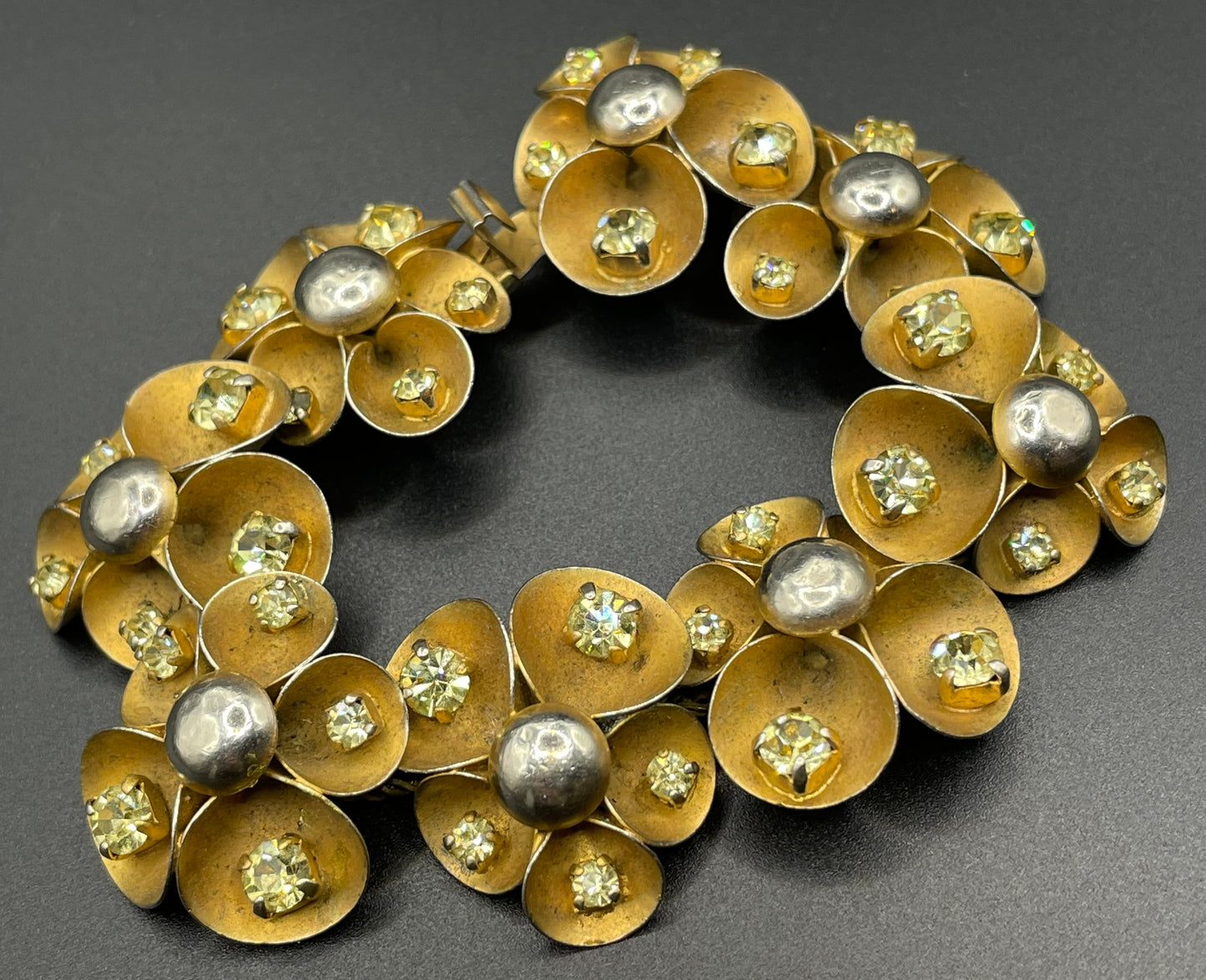 Vintage ornate floral bracelet, heavy moulded gold tone petals gold tone metal cabochon centres & yellow rhinestones, possible Haskell