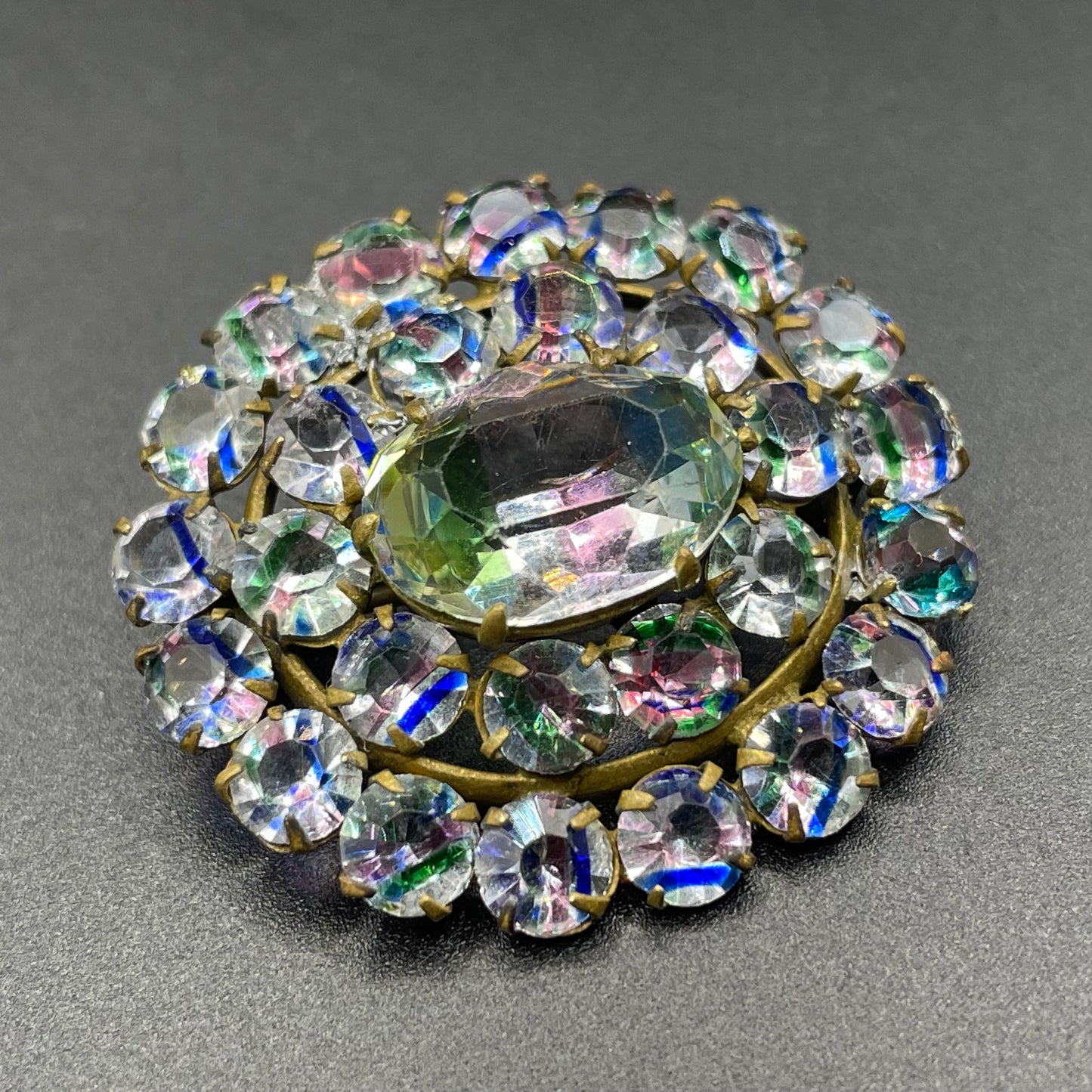 Petite vintage Art Deco iris glass rhinestone, open-backed, gold tone brooch pin, stunning rainbow pink, blue and green stripes