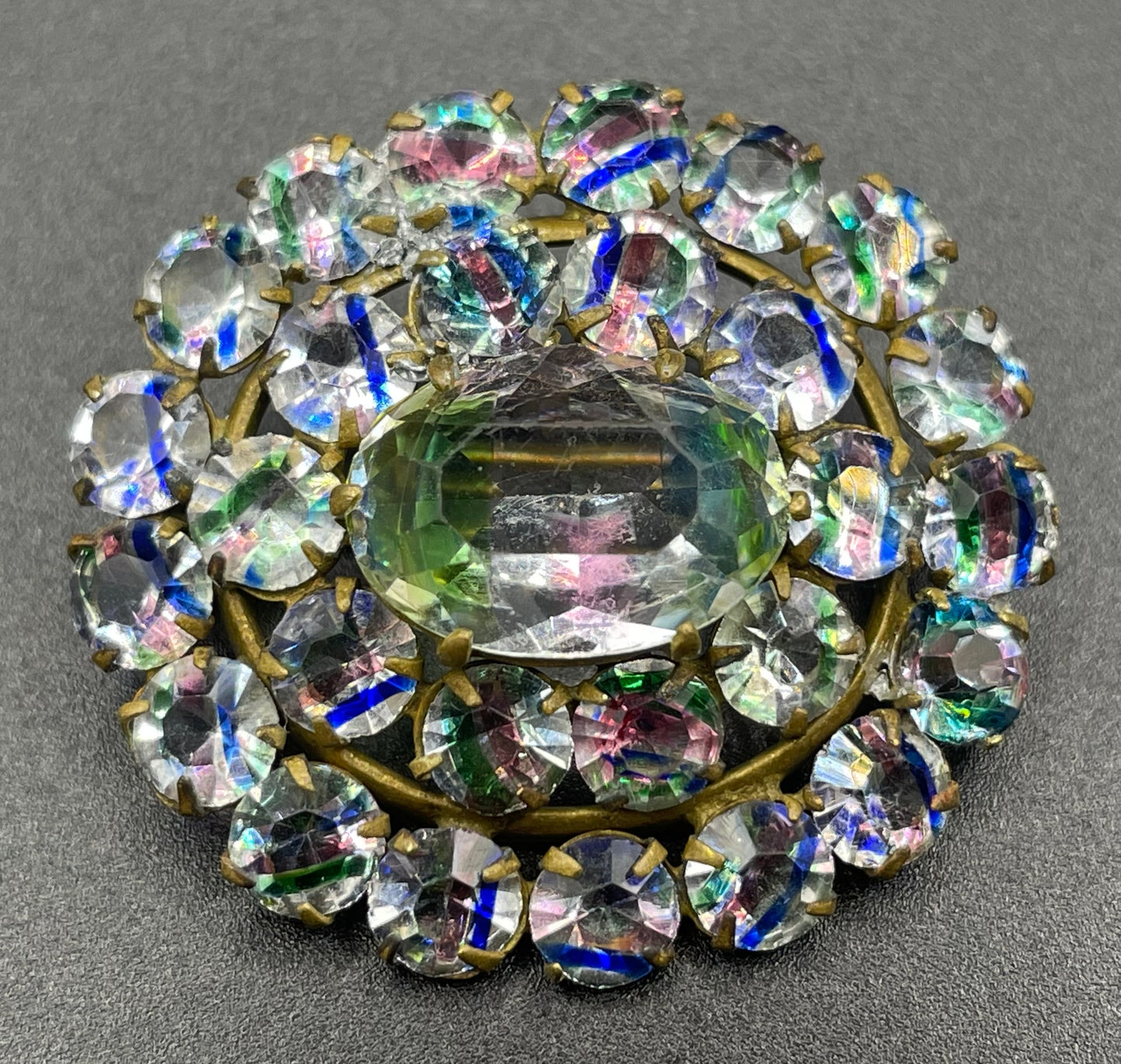 Petite vintage Art Deco iris glass rhinestone, open-backed, gold tone brooch pin, stunning rainbow pink, blue and green stripes