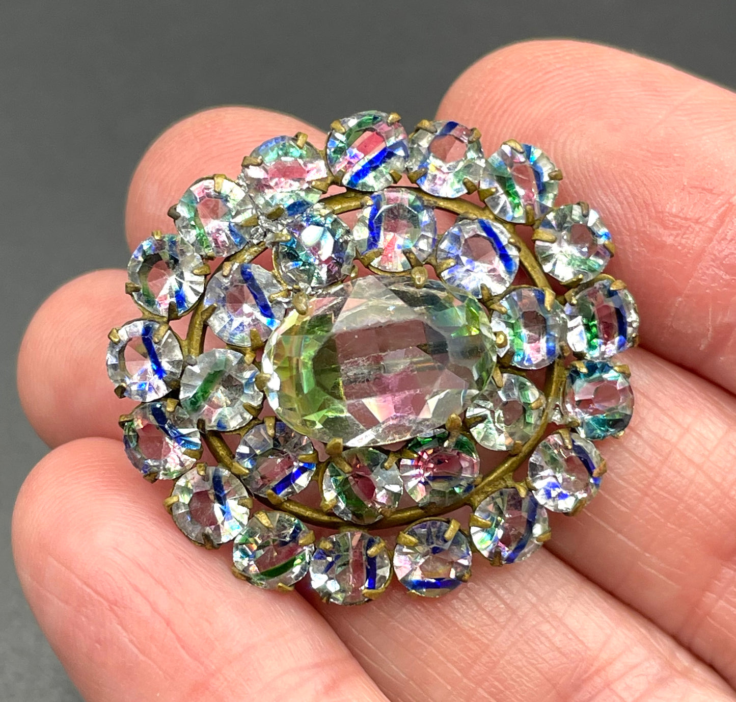 Petite vintage Art Deco iris glass rhinestone, open-backed, gold tone brooch pin, stunning rainbow pink, blue and green stripes