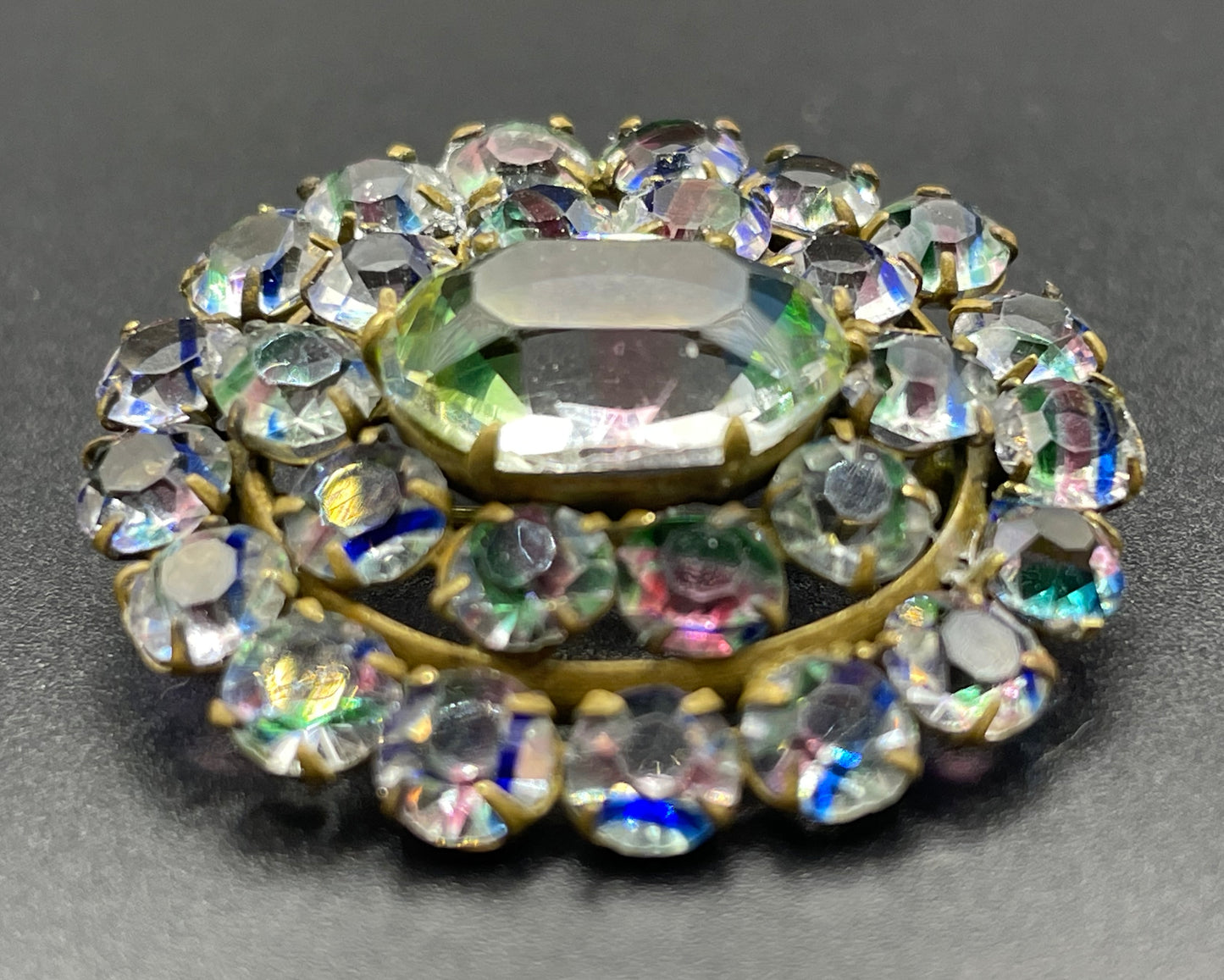 Petite vintage Art Deco iris glass rhinestone, open-backed, gold tone brooch pin, stunning rainbow pink, blue and green stripes