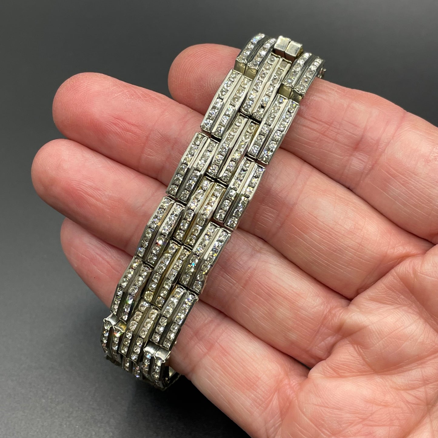 Vintage Art Deco Schreiber & Hiller (but unsigned) channel set clear paste rhinestone machine age stretch wide cocktail cuff bracelet