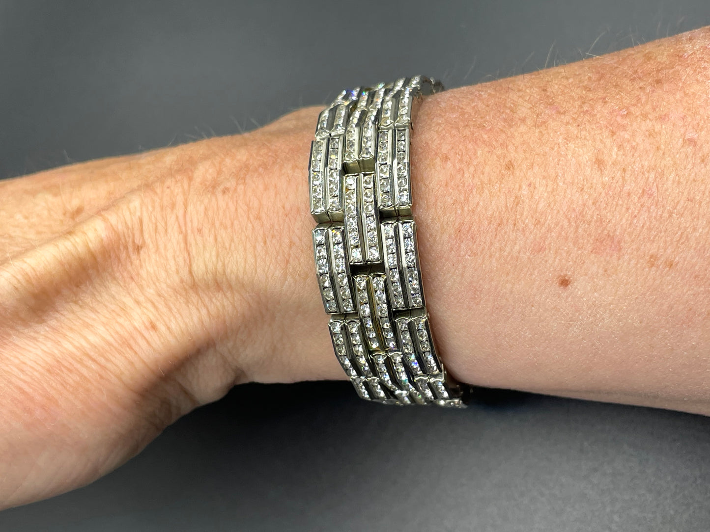 Vintage Art Deco Schreiber & Hiller (but unsigned) channel set clear paste rhinestone machine age stretch wide cocktail cuff bracelet