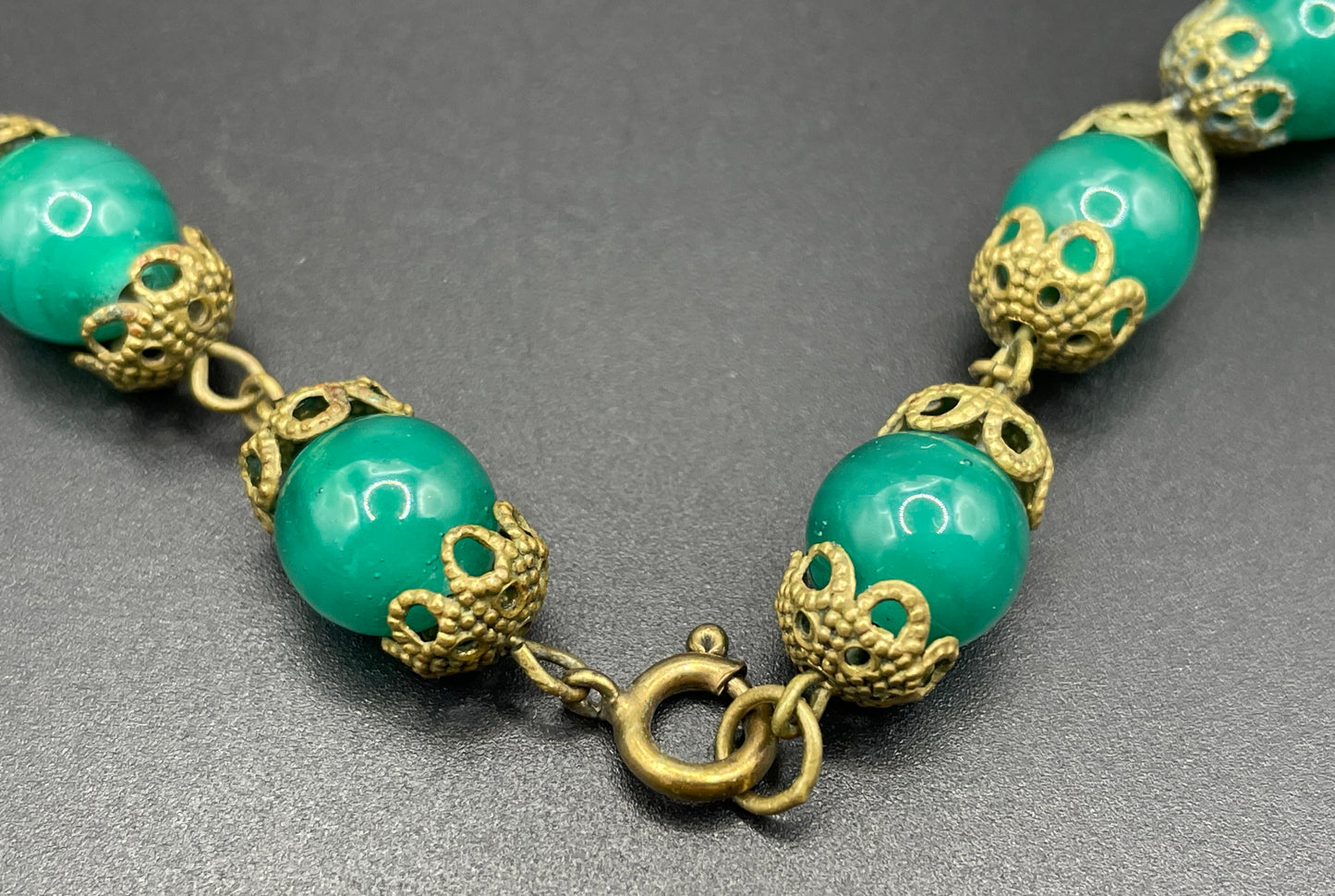 Vintage Art Deco Czech green Peking glass and gold tone filigree necklace, possibly Neiger Brothers (Max and Norbert)