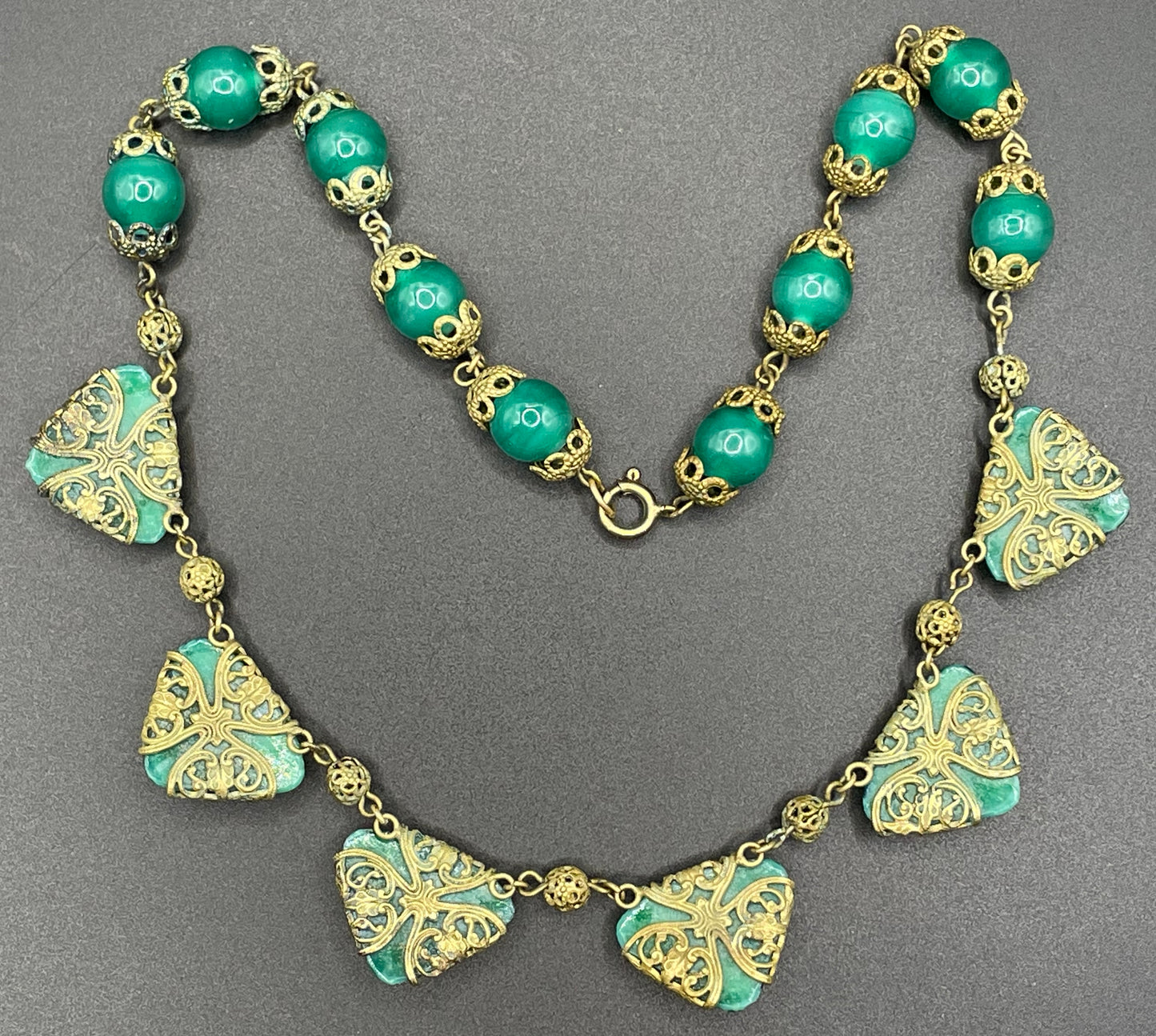 Vintage Art Deco Czech green Peking glass and gold tone filigree necklace, possibly Neiger Brothers (Max and Norbert)