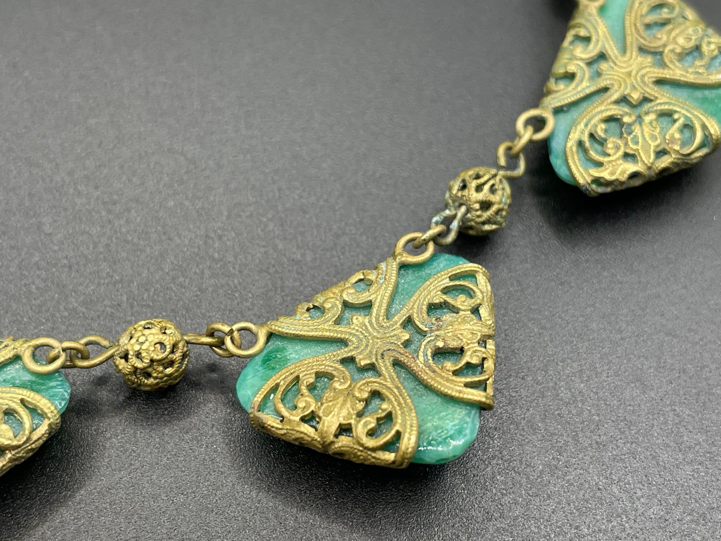 Vintage Art Deco Czech green Peking glass and gold tone filigree necklace, possibly Neiger Brothers (Max and Norbert)