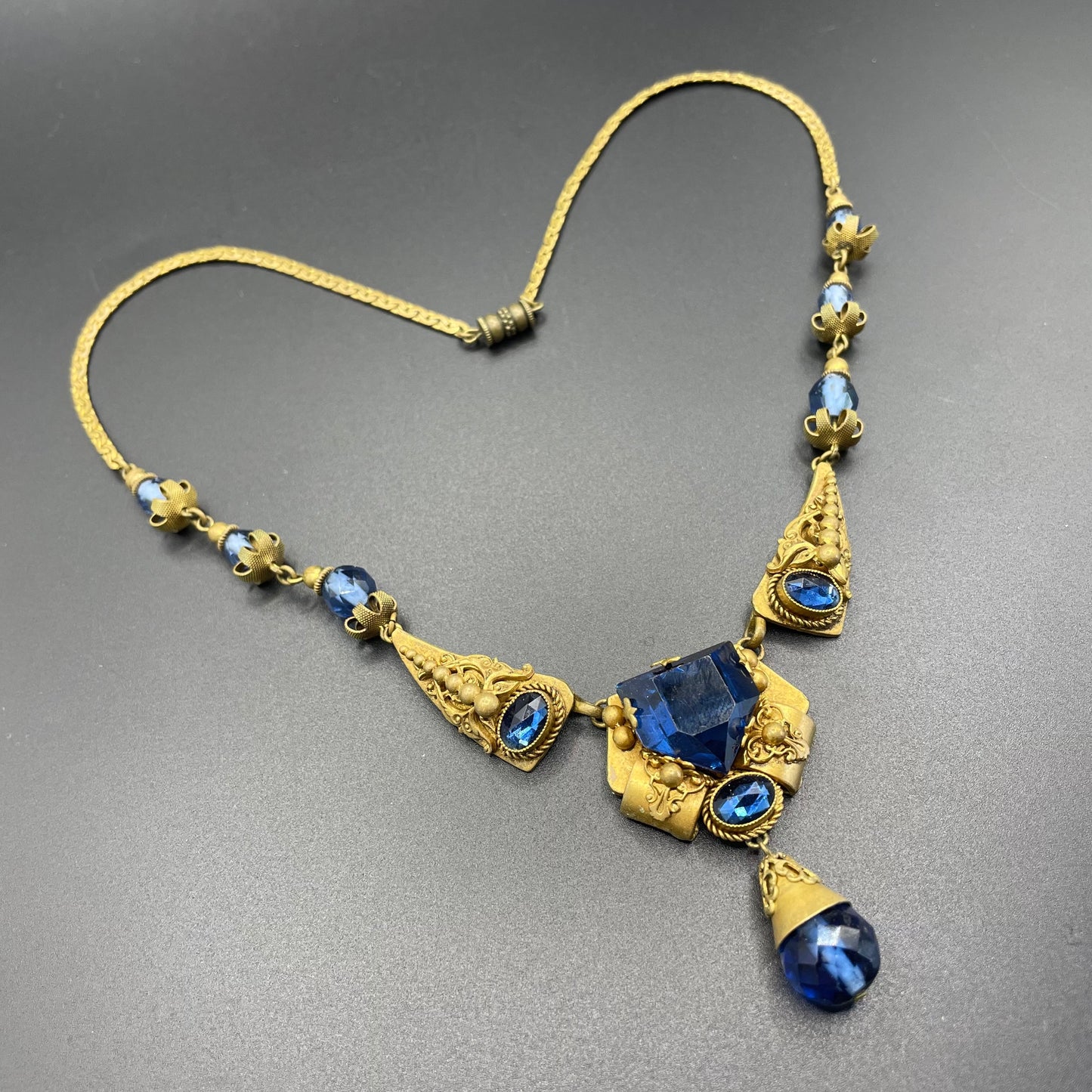 Vintage Neiger blue glass bead and rhinestone pendant style ornate Art Deco necklace in gold tone