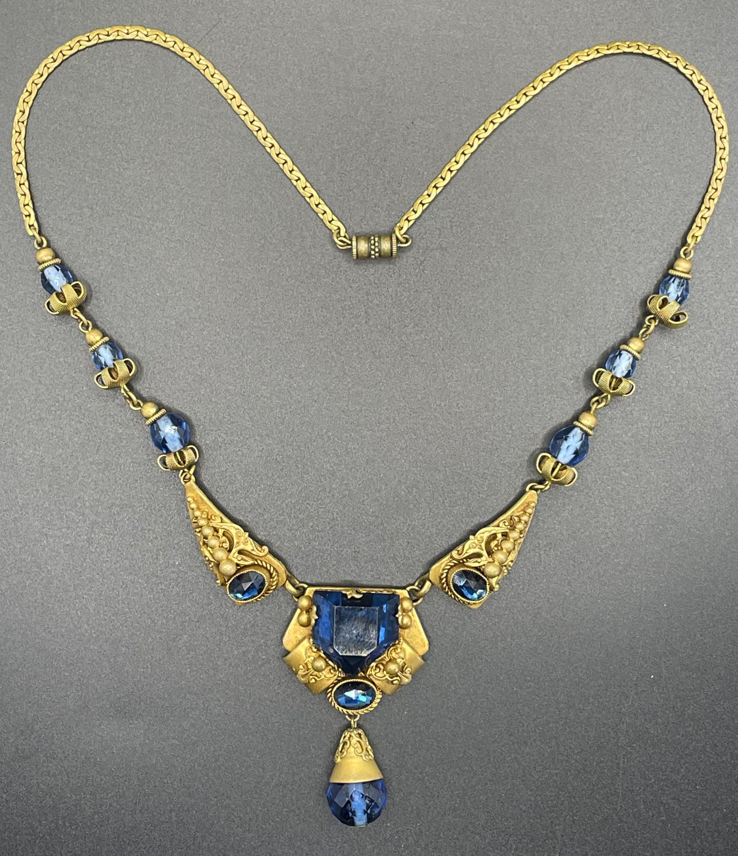 Vintage Neiger blue glass bead and rhinestone pendant style ornate Art Deco necklace in gold tone