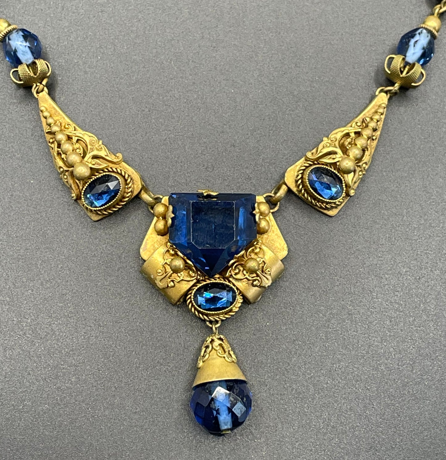 Vintage Neiger blue glass bead and rhinestone pendant style ornate Art Deco necklace in gold tone
