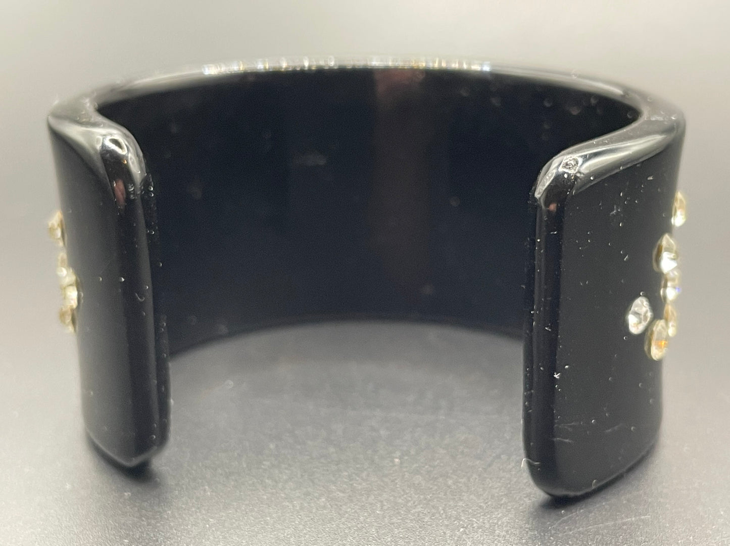 Vintage Christian Dior classic black plastic and clear crystal rhinestone logo cuff bangle