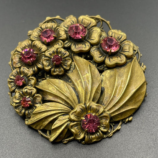 Vintage Art Deco Czech pink rhinestone brooch in a gorgeous gold tone floral and leaf design