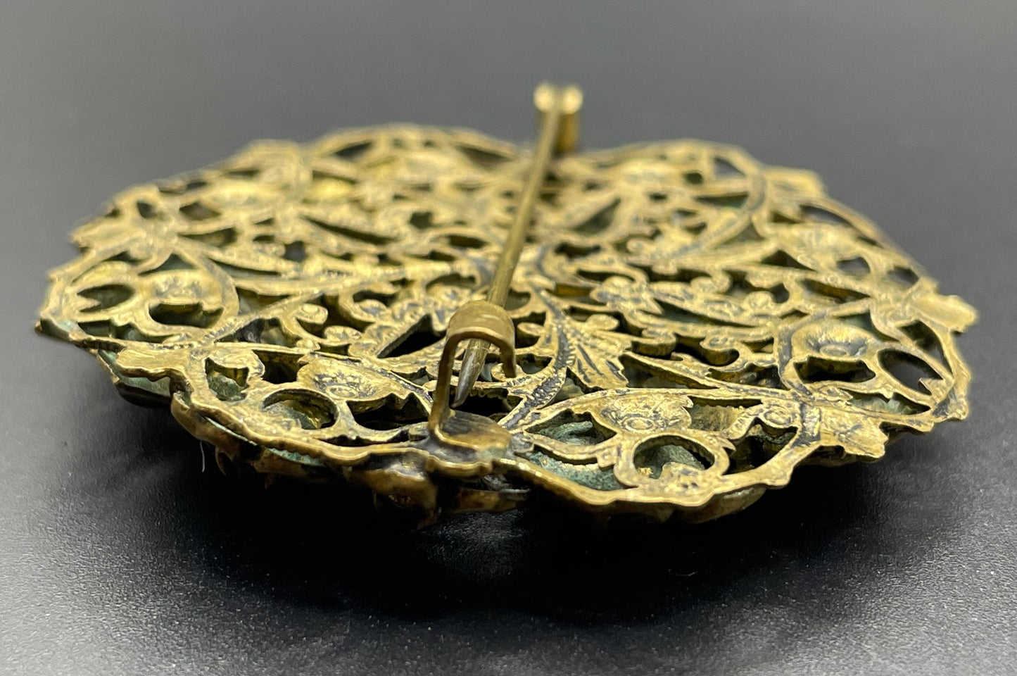 Vintage Art Deco Czech pink rhinestone brooch in a gorgeous gold tone floral and leaf design