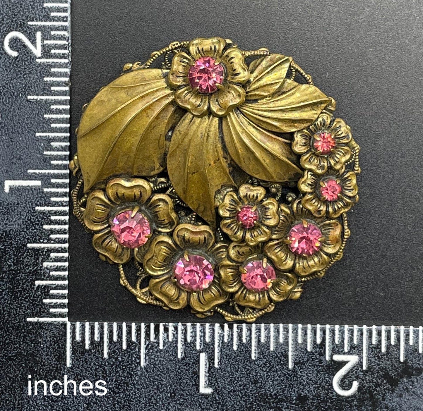 Vintage Art Deco Czech pink rhinestone brooch in a gorgeous gold tone floral and leaf design