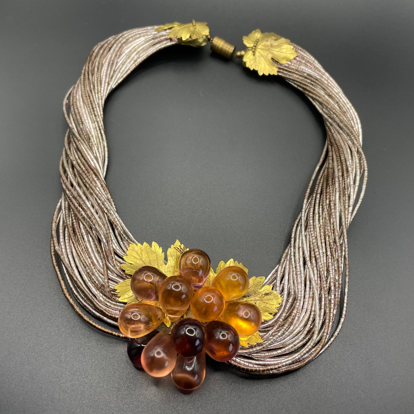 Vintage French Art Deco poured glass bead, gold tone and foiled wrapped multi-thread, possibly Louis Rousselet