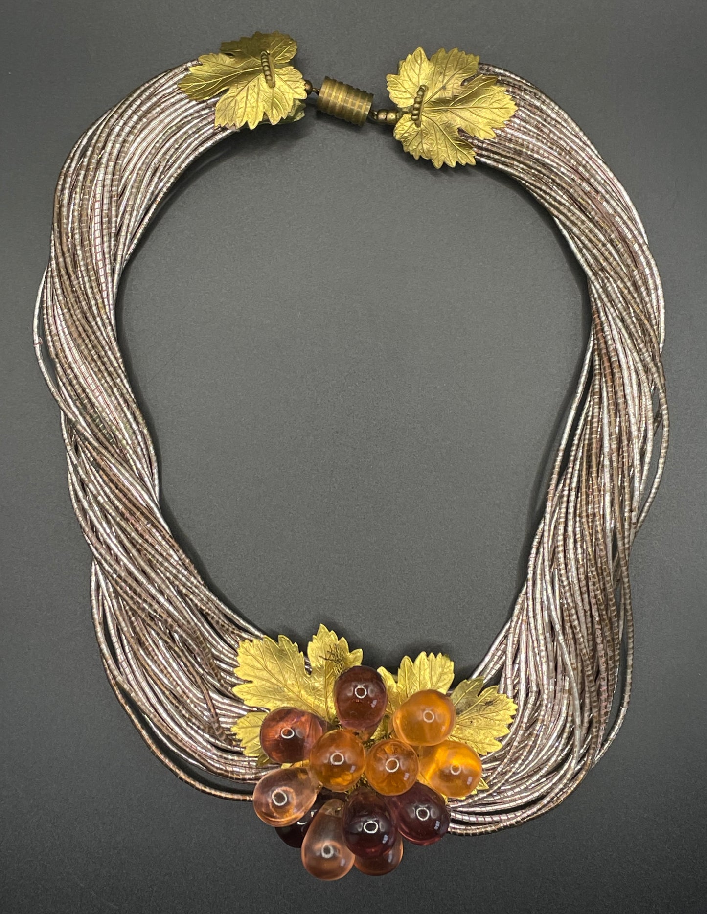 Vintage French Art Deco poured glass bead, gold tone and foiled wrapped multi-thread, possibly Louis Rousselet