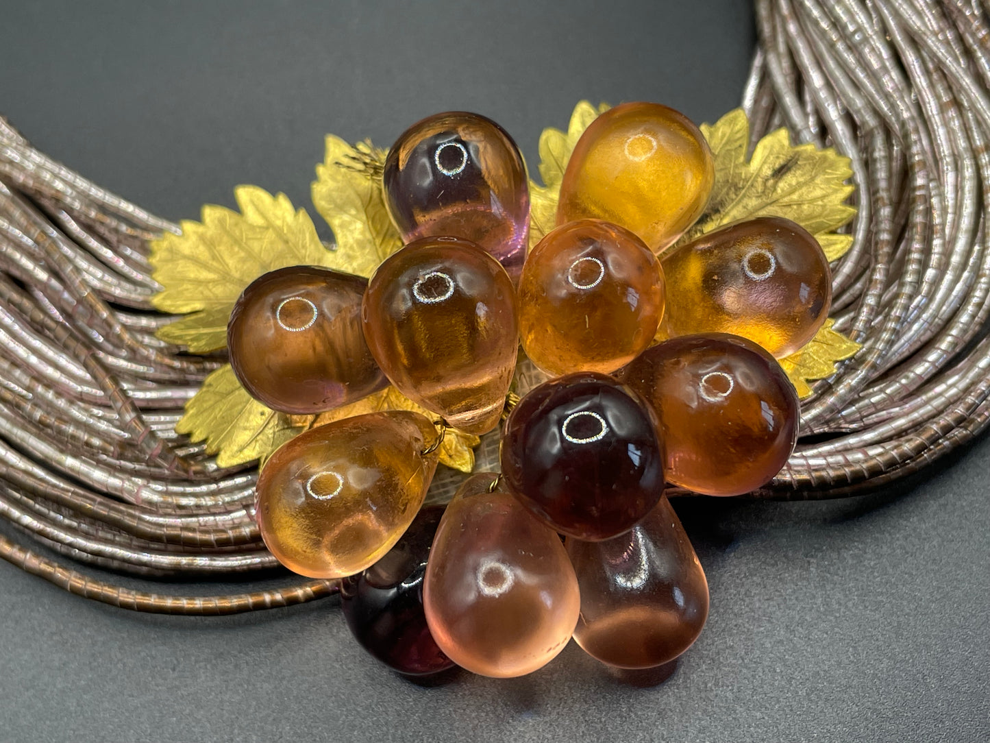 Vintage French Art Deco poured glass bead, gold tone and foiled wrapped multi-thread, possibly Louis Rousselet