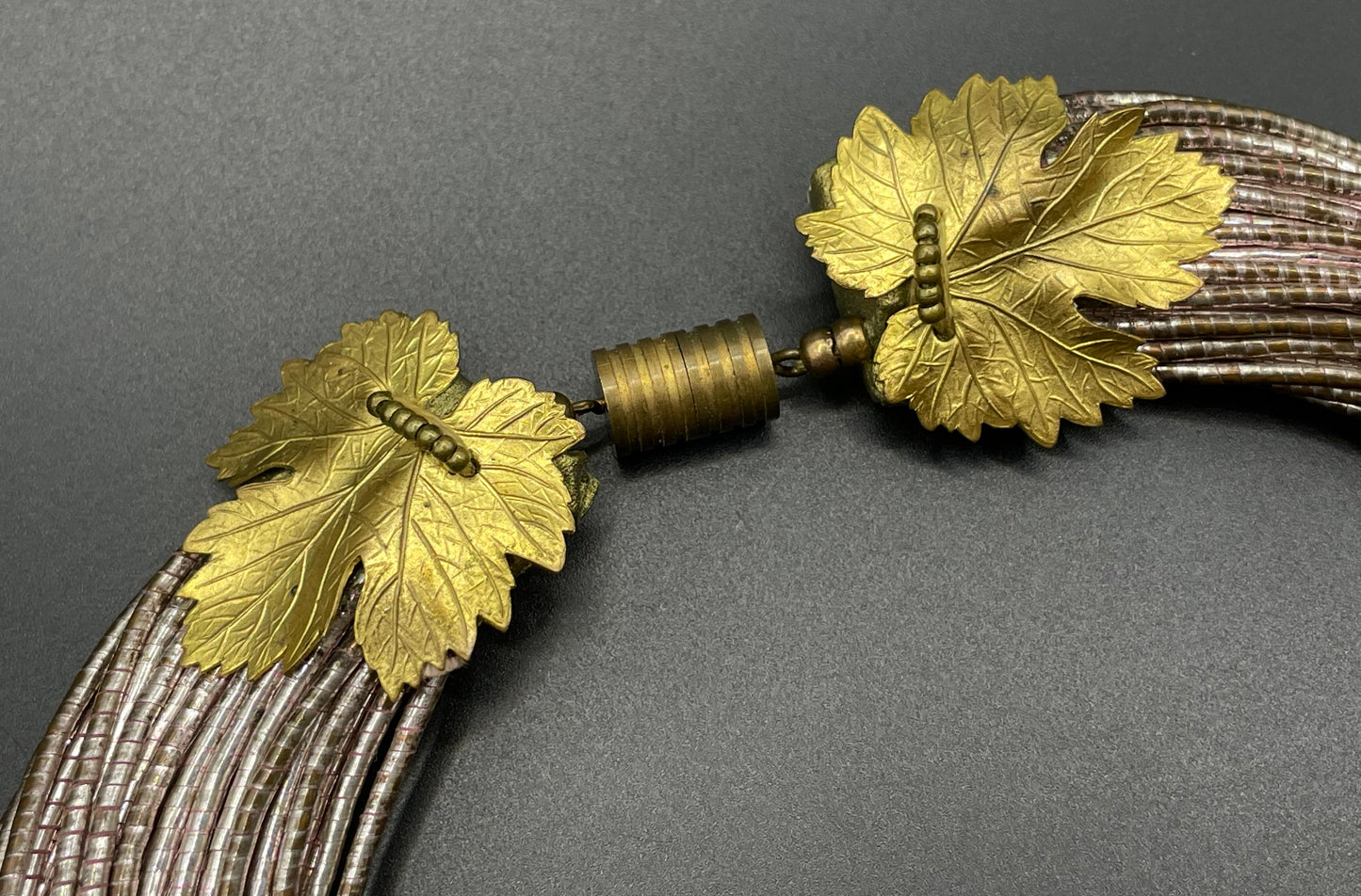 Vintage French Art Deco poured glass bead, gold tone and foiled wrapped multi-thread, possibly Louis Rousselet