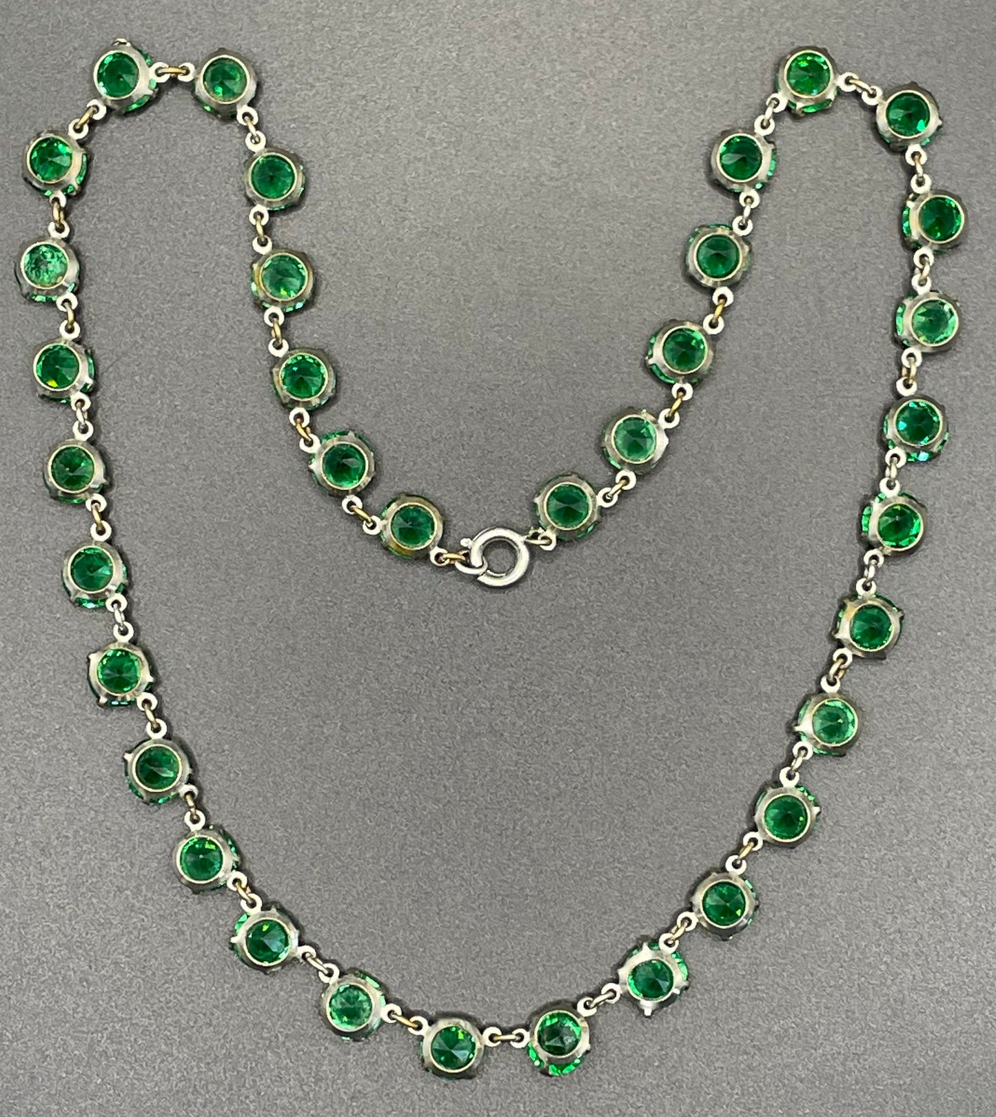Vintage Art Deco bezel set gorgeous emerald green crystal riviere necklace with bezel set, open-backed stones