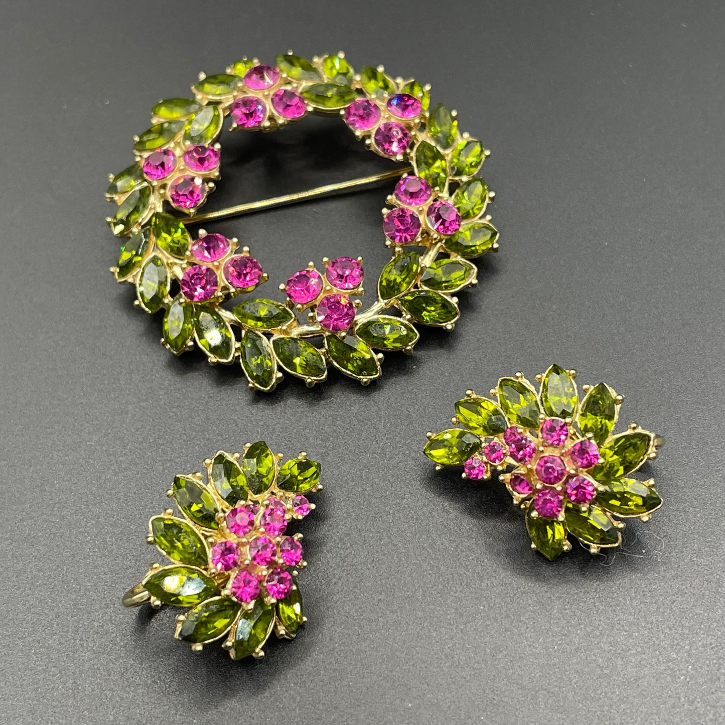 Vintage signed Trifari pink and green rhinestone brooch and clip on earrings set, early 1960s, probably the 'Contessa' collection