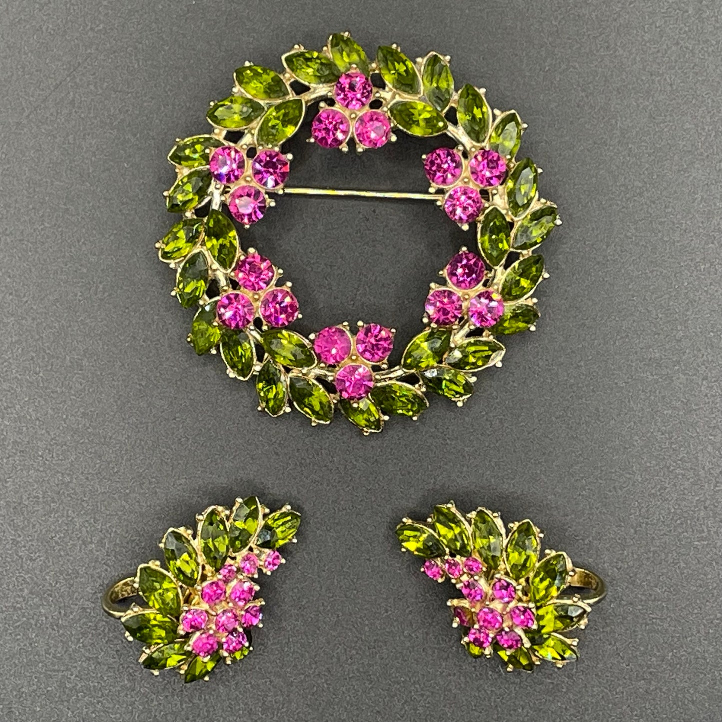 Vintage signed Trifari pink and green rhinestone brooch and clip on earrings set, early 1960s, probably the 'Contessa' collection