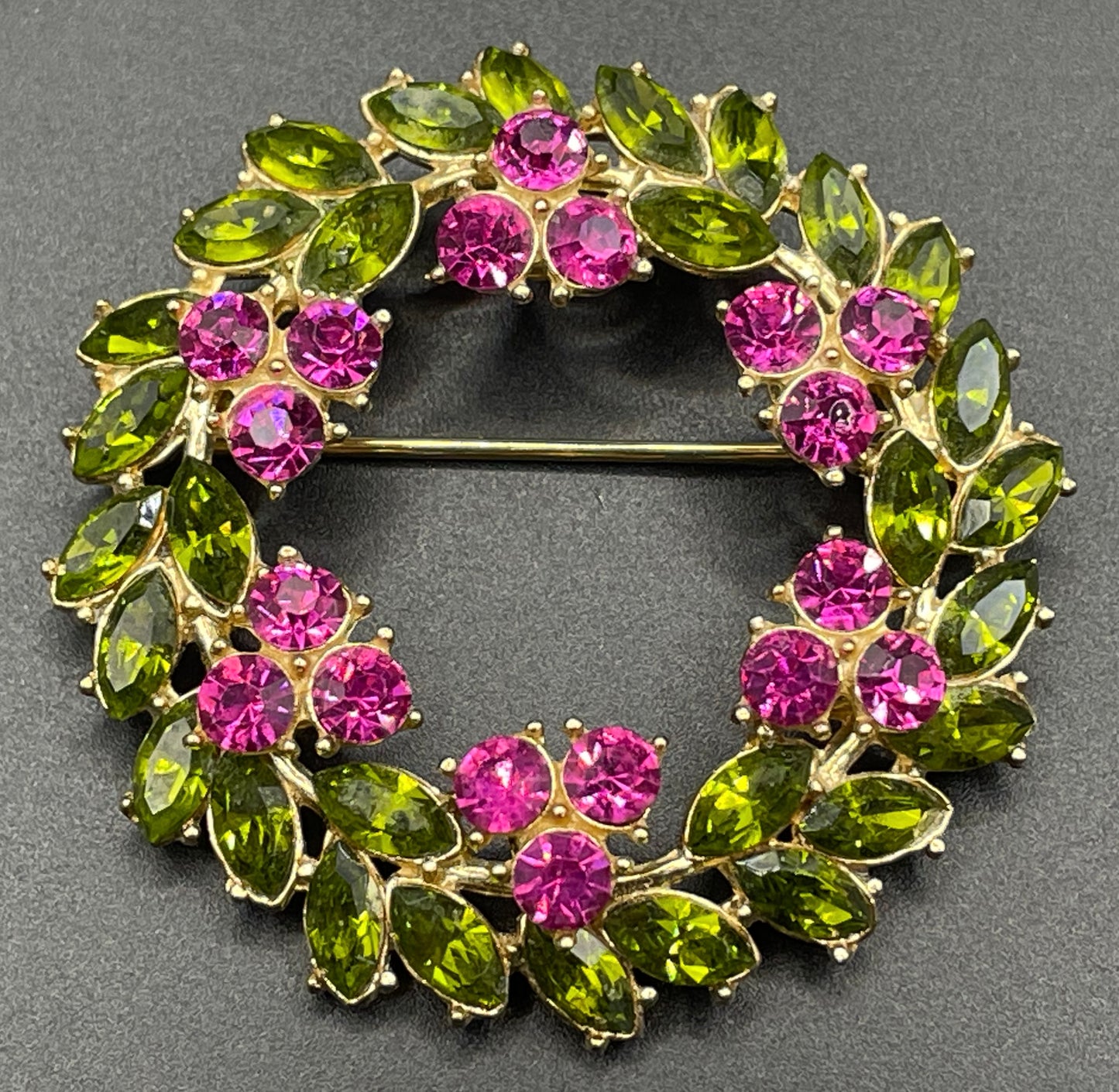 Vintage signed Trifari pink and green rhinestone brooch and clip on earrings set, early 1960s, probably the 'Contessa' collection