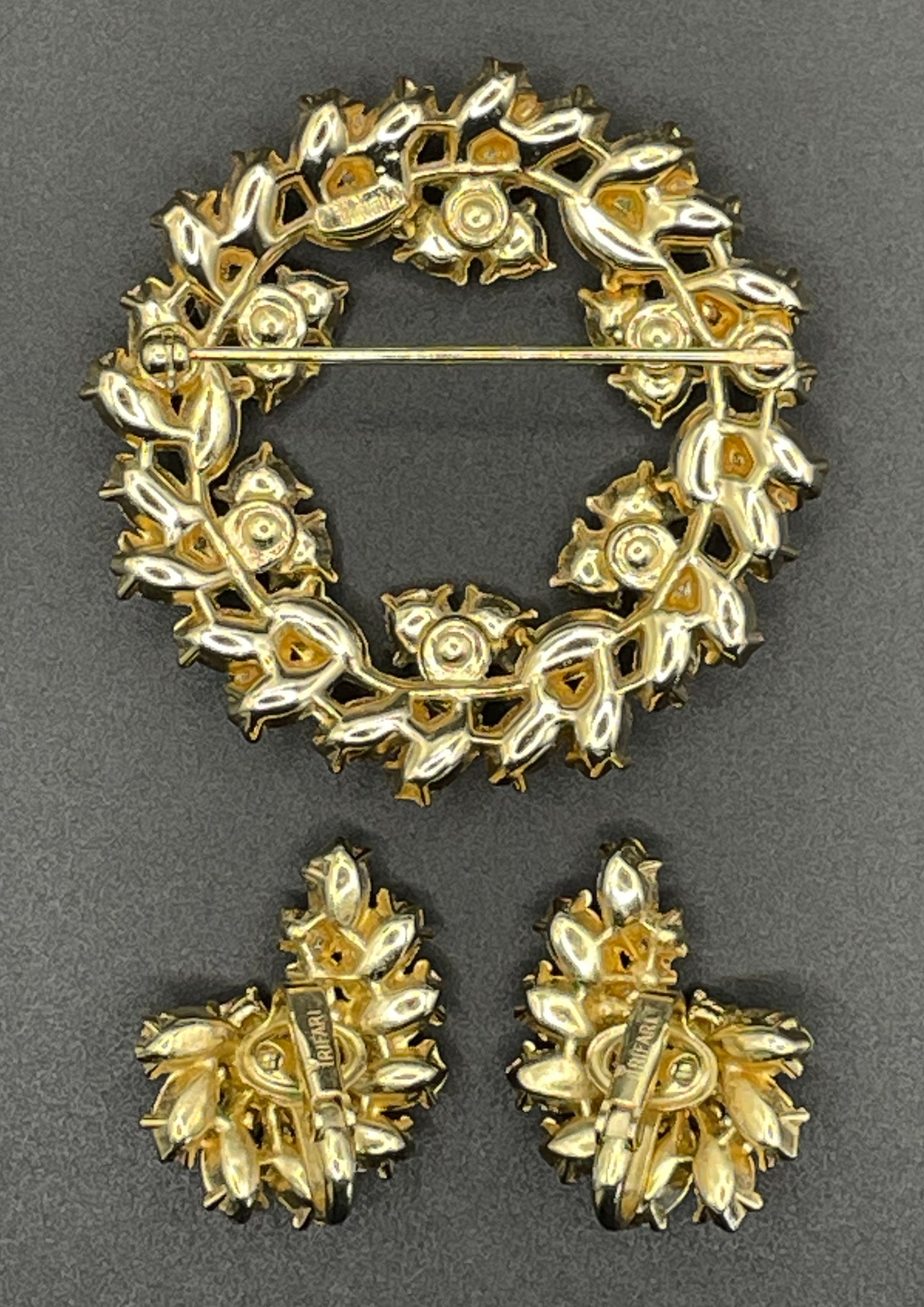 Vintage signed Trifari pink and green rhinestone brooch and clip on earrings set, early 1960s, probably the 'Contessa' collection