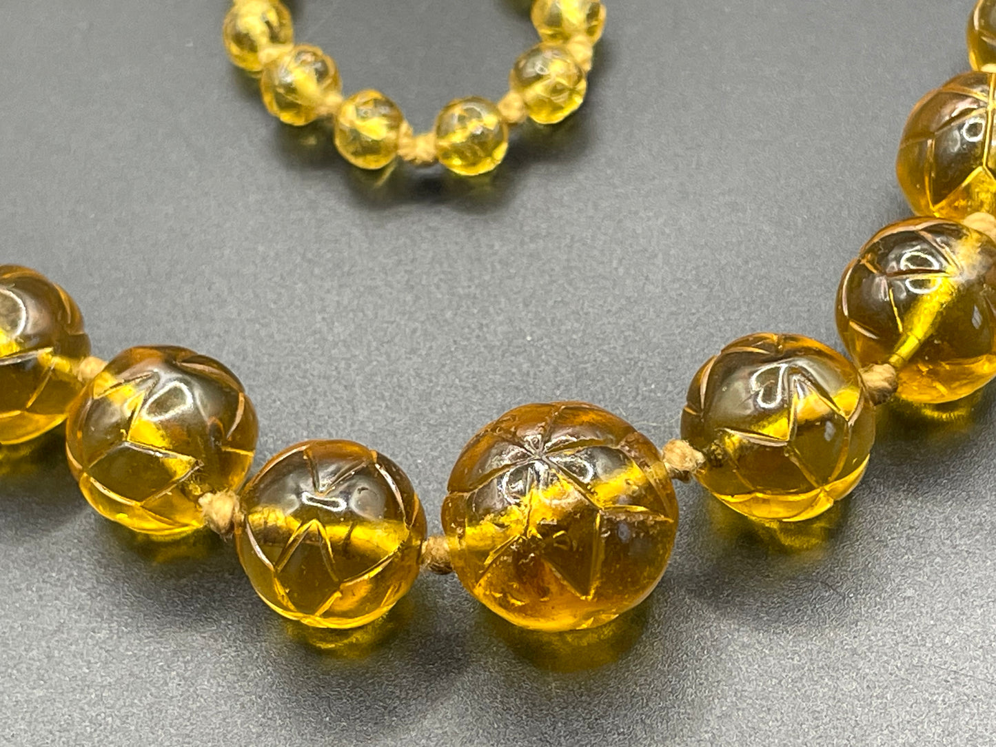 Vintage moulded pressed glass citrine yellow / orange graduated bead flapper necklace mid to longer length