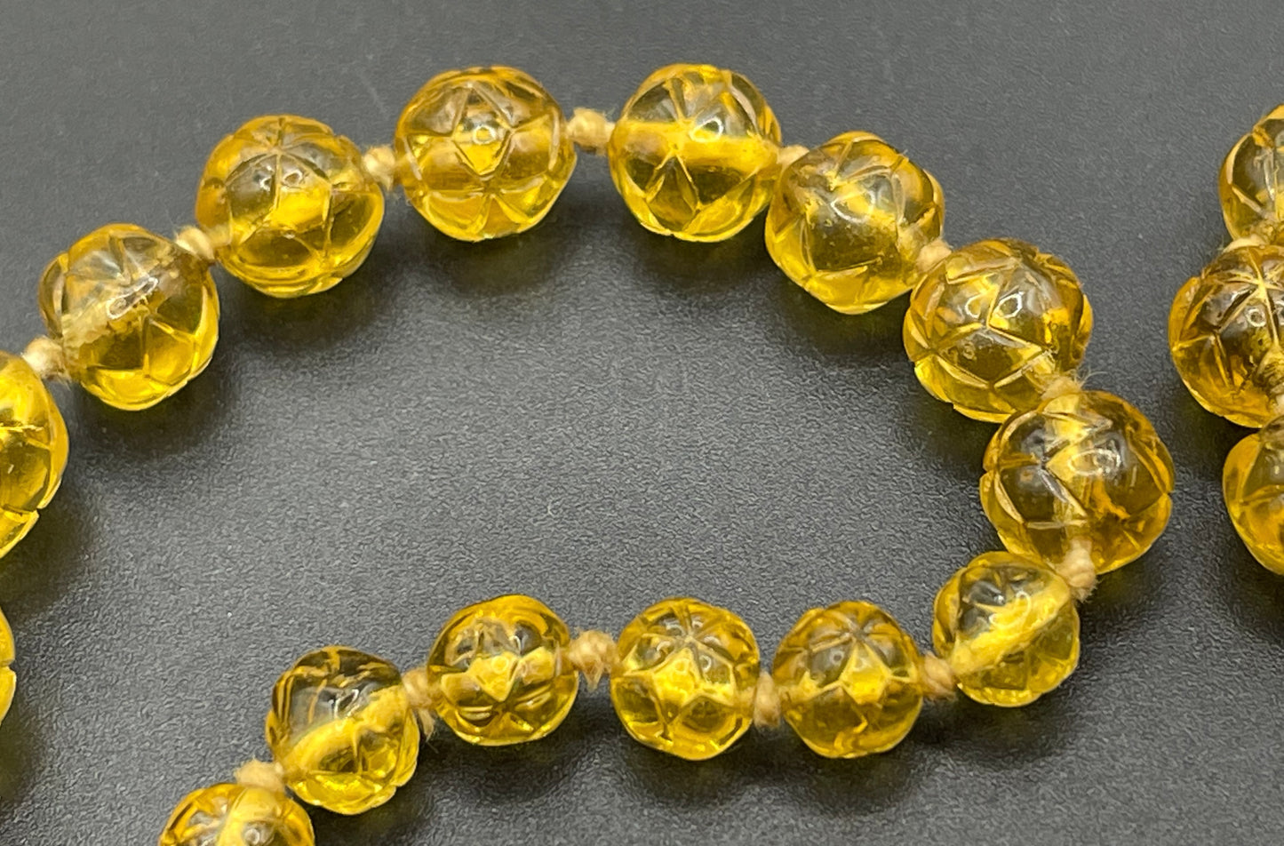 Vintage moulded pressed glass citrine yellow / orange graduated bead flapper necklace mid to longer length