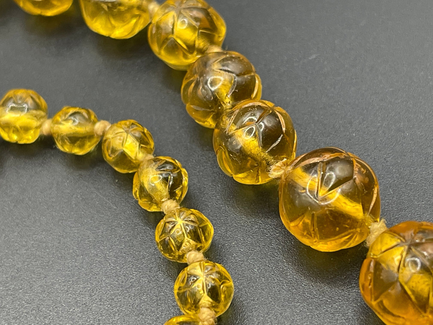 Vintage moulded pressed glass citrine yellow / orange graduated bead flapper necklace mid to longer length