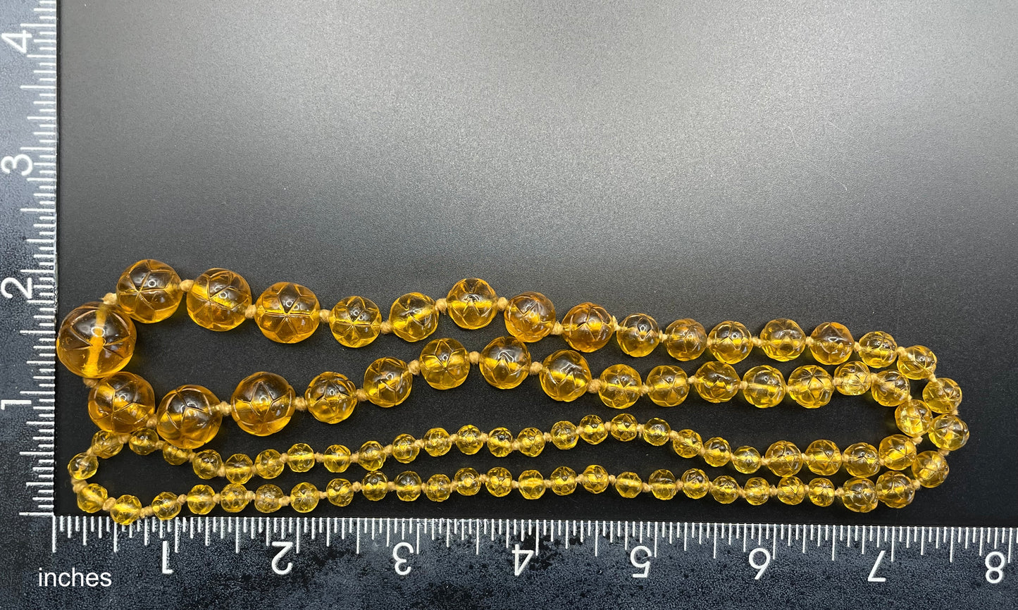Vintage moulded pressed glass citrine yellow / orange graduated bead flapper necklace mid to longer length
