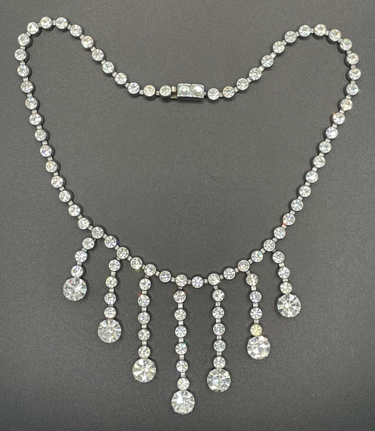 Vintage Art Deco clear paste crystal silver tone riviere fringe necklace with collet set rhinestones