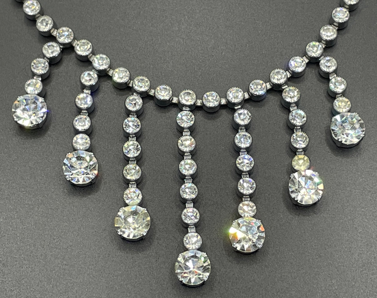 Vintage Art Deco clear paste crystal silver tone riviere fringe necklace with collet set rhinestones
