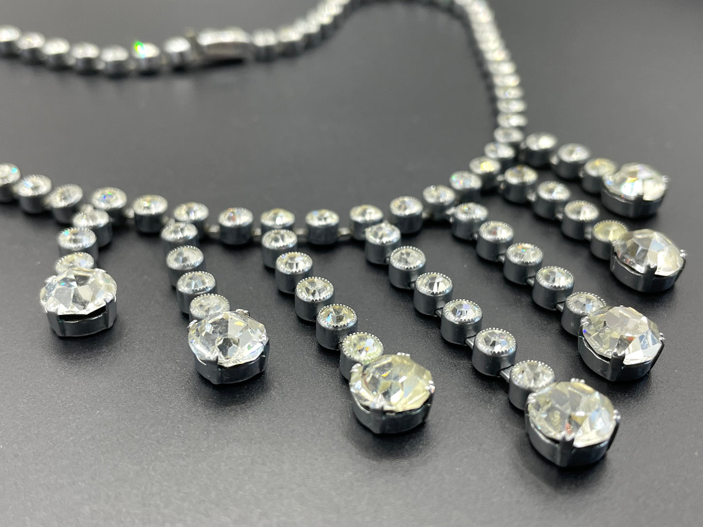 Vintage Art Deco clear paste crystal silver tone riviere fringe necklace with collet set rhinestones