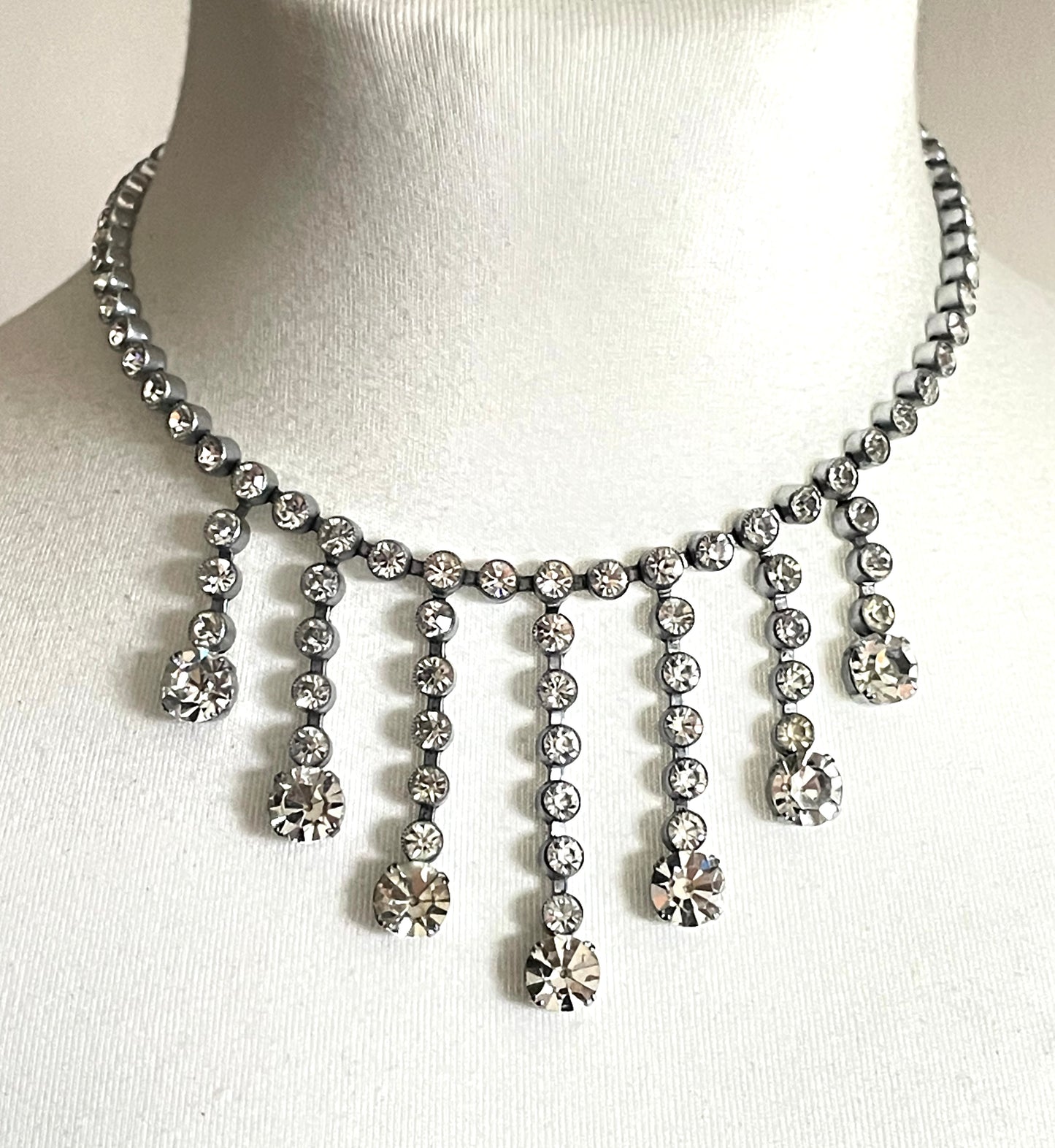 Vintage Art Deco clear paste crystal silver tone riviere fringe necklace with collet set rhinestones