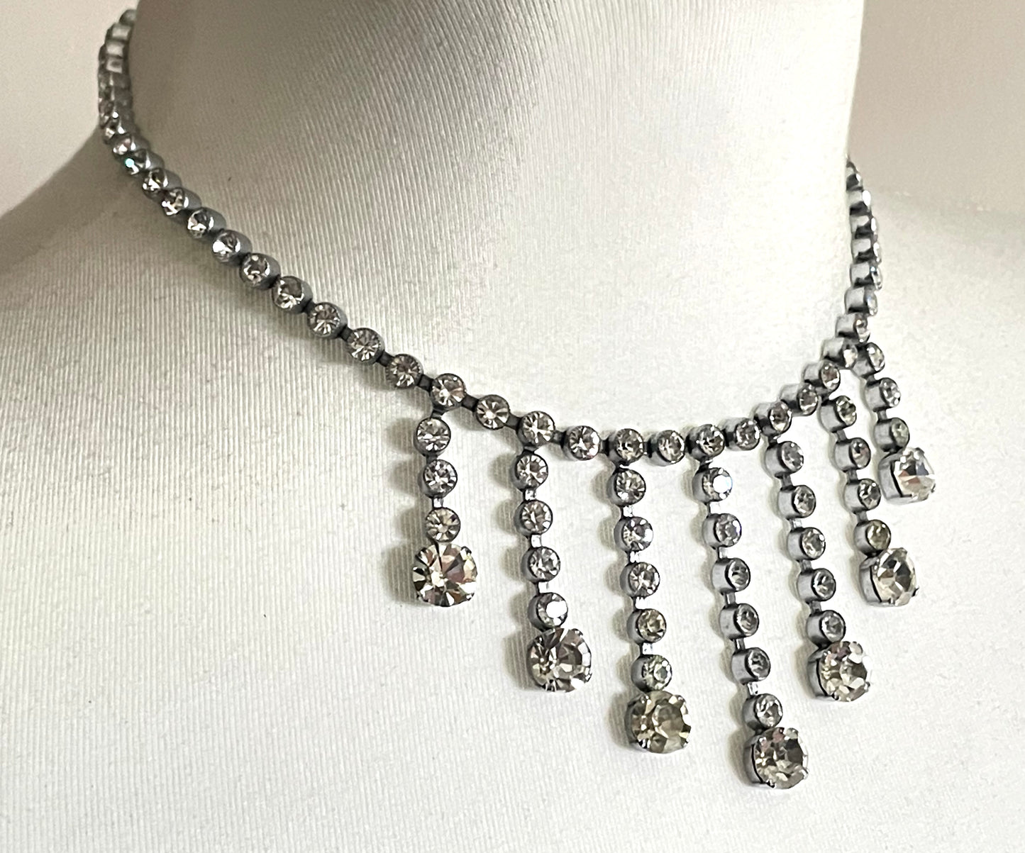 Vintage Art Deco clear paste crystal silver tone riviere fringe necklace with collet set rhinestones