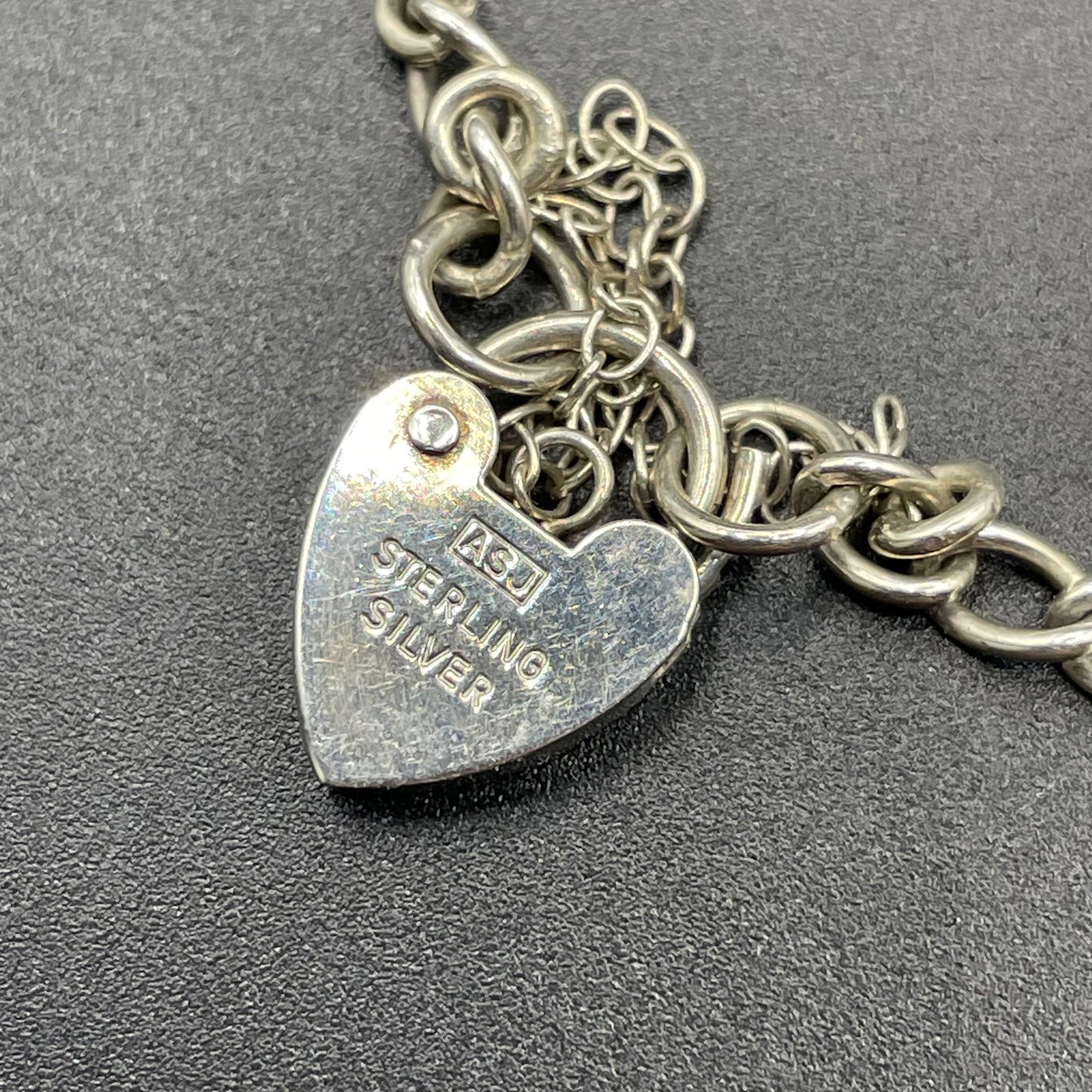 Vintage Cicely Mary Barker Flower Fairies 925 sterling silver fairy charm bracelet hallmarked by ASJ jewellers, 25 grams