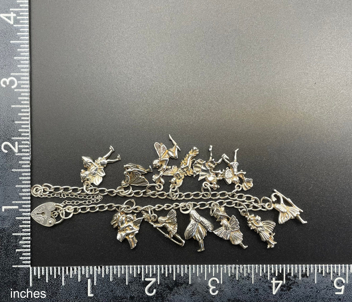 Vintage Cicely Mary Barker Flower Fairies 925 sterling silver fairy charm bracelet hallmarked by ASJ jewellers, 25 grams