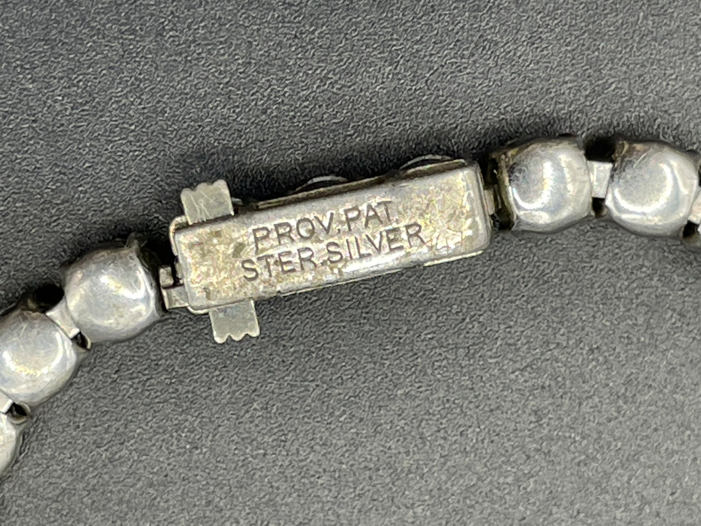 Vintage sterling silver stamped 'ster silver' ice clear rhinestone fringe necklace, signed 'prov pat'