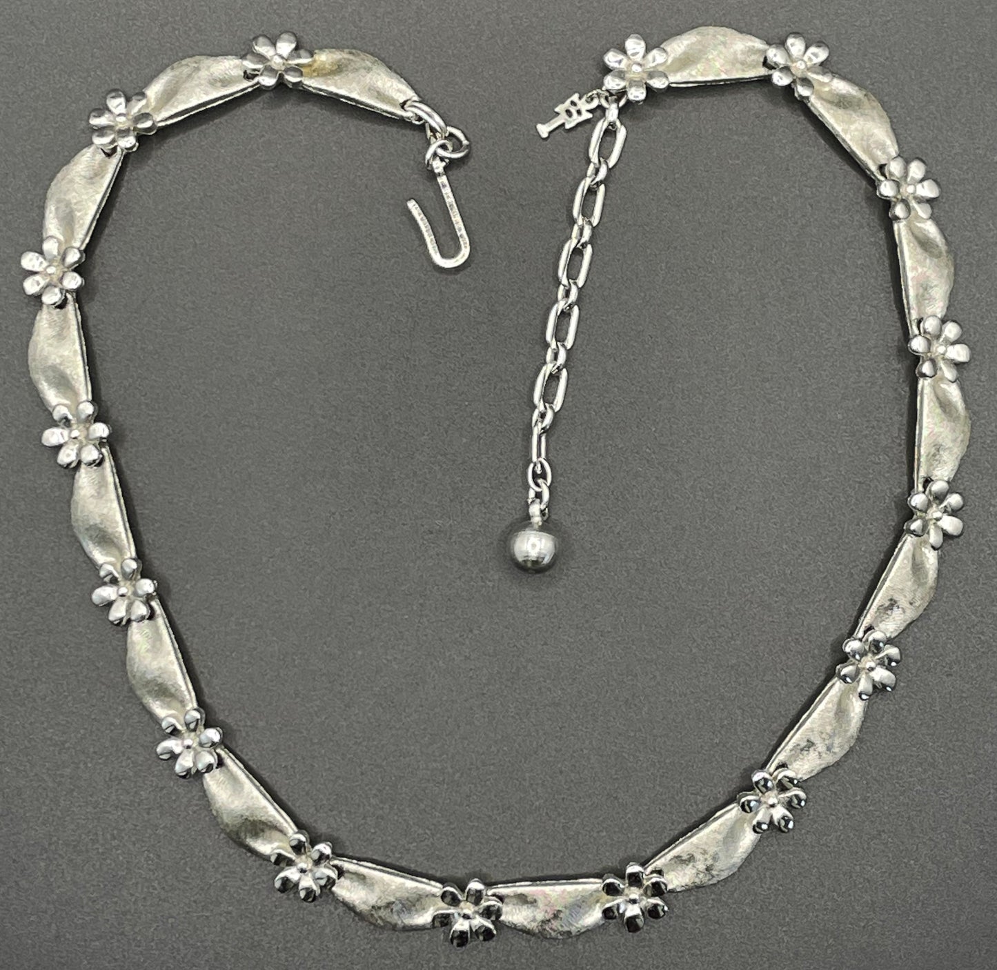 Vintage signed Trifari classic silver tone birthday series ribbon daisy flower choker necklace