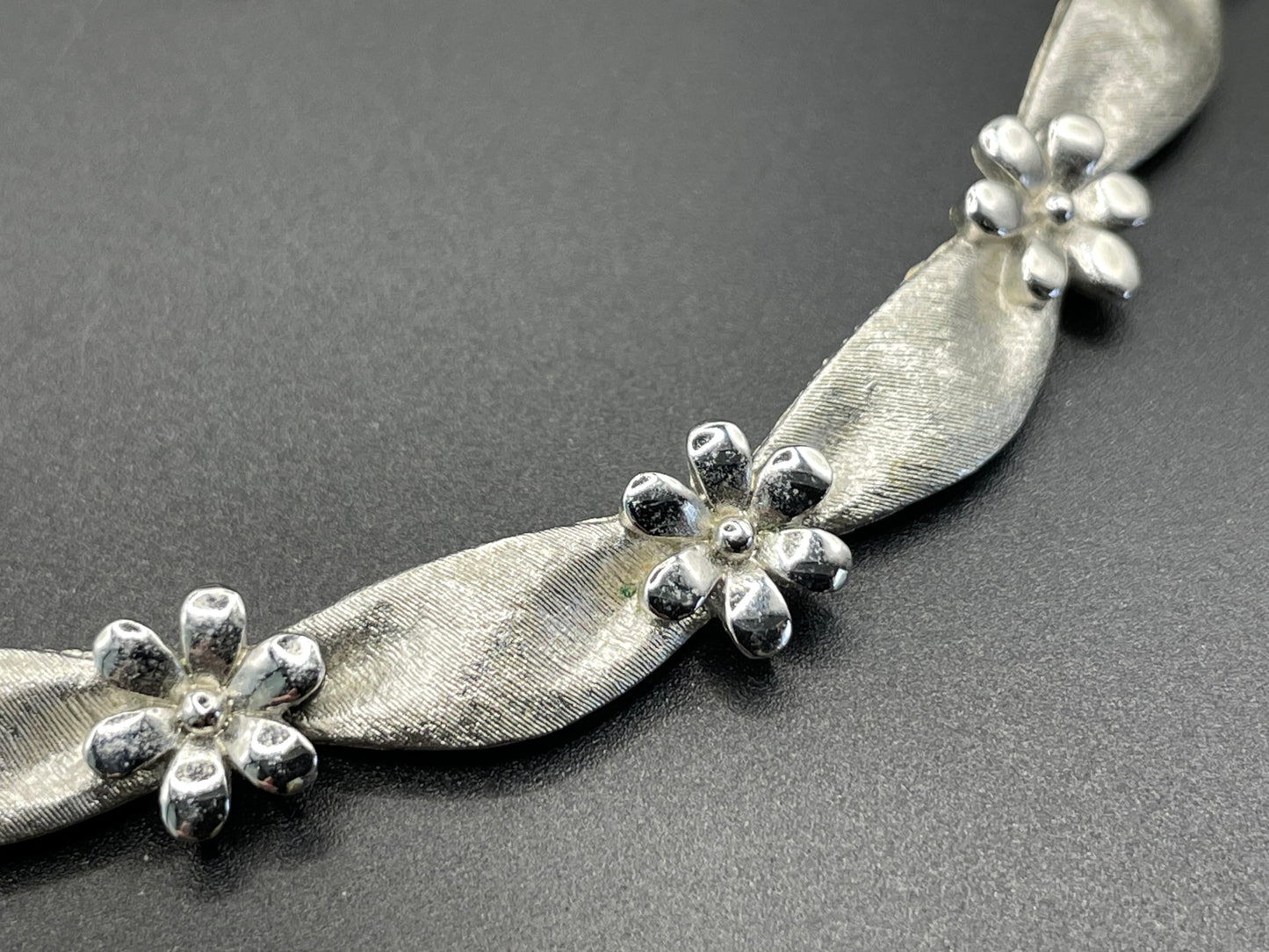 Vintage signed Trifari classic silver tone birthday series ribbon daisy flower choker necklace