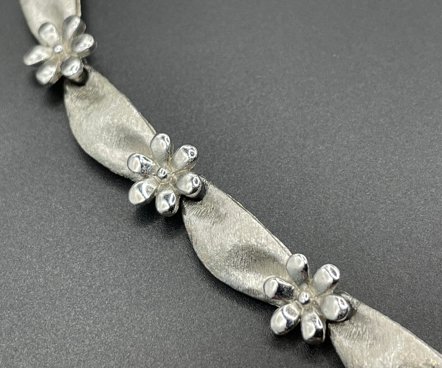 Vintage signed Trifari classic silver tone birthday series ribbon daisy flower choker necklace